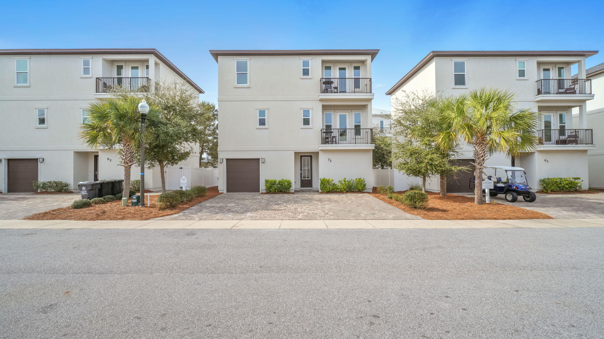 Beautifully updated luxury home in the heart of Miramar Beach, built in 2019 and perfectly positioned within walking and golf cart distance to the beach. This spacious 4BR home and 4.5 bathrooms offers an ideal blend of coastal elegance, comfort, and income potential. Designed with both style and functionality in mind, the home features quartz countertops, wood plank tile flooring throughout, walk-in closets, and a thoughtfully designed open-concept layout ideal for entertaining. This home offers 2 balconies,  2 laundry rooms, & a backyard w/ patio perfect for entertaining or BBQ's. Offered fully furnished, this property is truly turnkey and includes a 6-seater golf cart, making beach days effortless. Located in a desirable neighborhood with a community pool, this property allows short-term rentals and has a projected rental income of $110,000-$120,000. Walking distance to local favorites like Pompano Joe's, Bad Ass Coffee, Pascalli's + more!