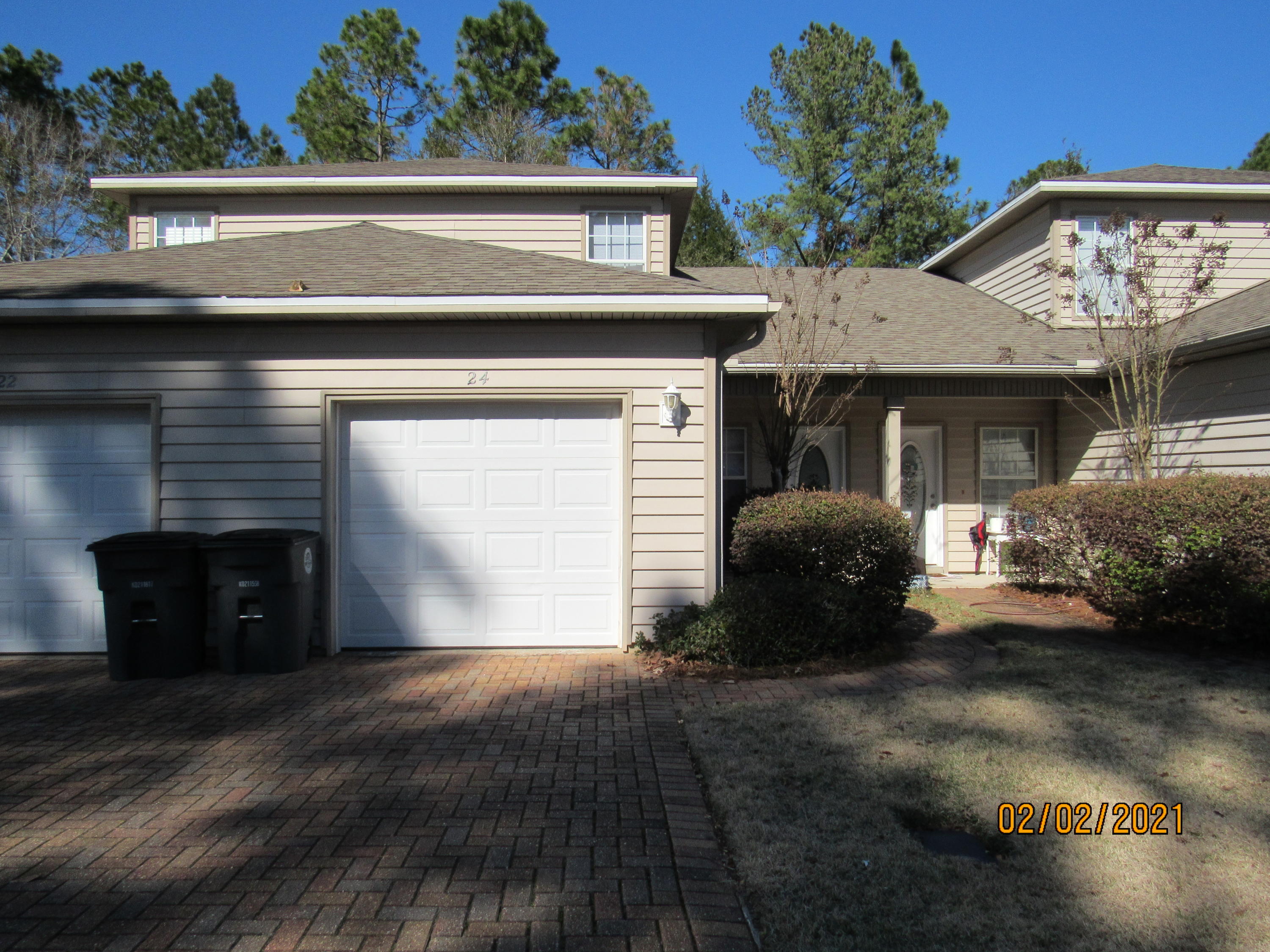 Well-maintained 3 bedroom, 2 bath townhome with upgrades close to bases, beaches, shopping, restaurants, schools, and more! This home features a pavered drive as well as a 1-car garage, and lawn care is included! On the first floor are a spacious living room with a door leading out to the back patio, a nice kitchen boasting stainless appliances, granite counter tops, and plenty of cabinet space, a dining room with arched doorways, the laundry (washing machine and dryer included), and the master bedroom with its own en suite and sliding glass door access to that patio. Upstairs are two additional bedrooms and another full bath. Pets may be considered with prior owner approval and a non-refundable pet fee. No smoking (including vapes).