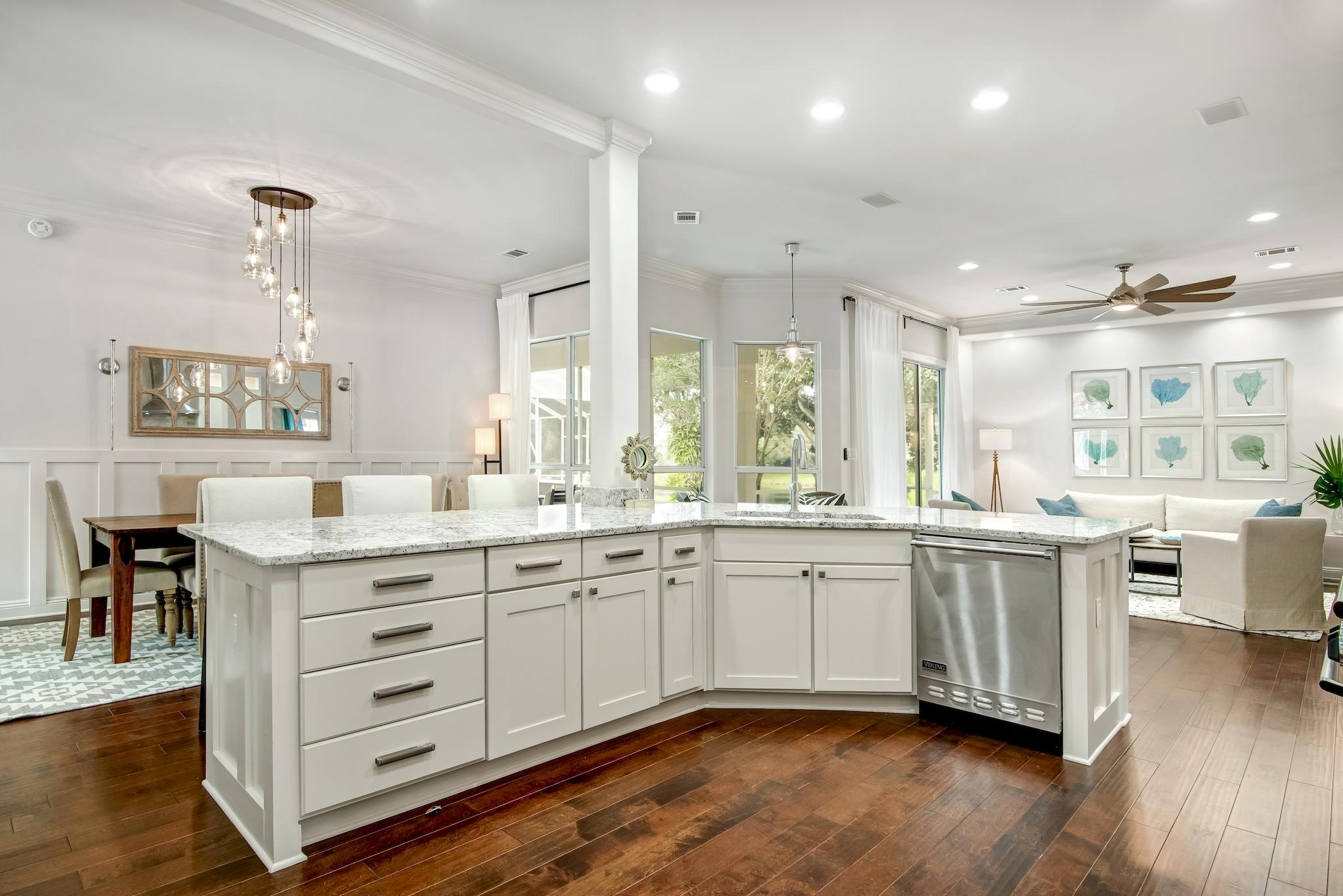 RENOVATED & Flawless! New roof, New A/C, Viking appliances, gas range, 4 bedrooms, 3 baths, lake front, gated community, solid wood flooring, marble baths, light and open floor plan, large garage, walk in closets. PERFECT CONDITION!