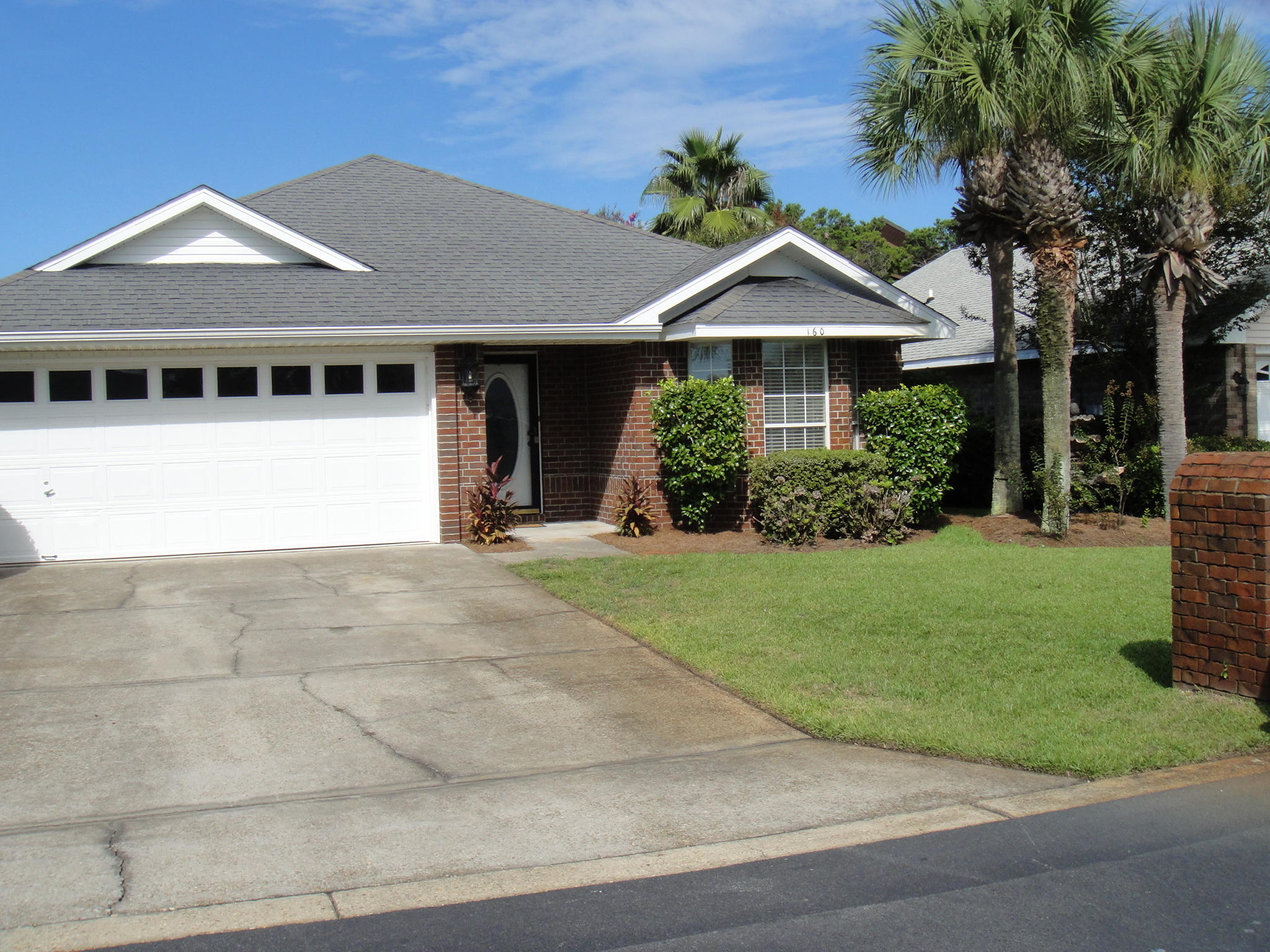 Your newly painted home is just a short walk to your deeded beach access. This 3 bedroom 2 bath split floor plan will make an ideal primary residence or secondary vacation home. Would also make a great money making rental in this sort after walk to the beach community. Large great room with fireplace, separate kitchen with dining area. Master bedroom features a walk-in closet and twin vanities. The large backyard could handle a pool but the large community pool is just steps away.