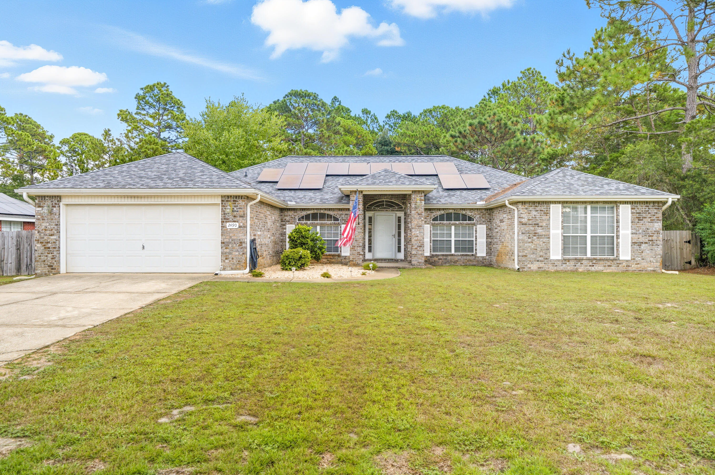 MOVE-IN READY 4BR/2BA Home in Highly Desirable Holley By The Sea! This all-brick beauty features luxury laminate flooring, updated appliances, large fenced backyard with screened porch, fire pit & greenhouse! Boasting a generous split floor plan, vaulted ceilings & a massive chef's kitchen complete with pantry & command center. Enjoy a flexible floor plan with a formal dining room & formal living room/potential home office, playroom etc. Solar in place.

Situated on a half-acre lot & no rear neighbors for added privacy. Tenants enjoy EXCLUSIVE HBTS Amenities including: an 8-acre recreation center, gym, 3 pools, tennis courts, waterfront park/fishing pier & boat launch. (see HolleyByTheSea.org)

Minutes to Navarre Beach and top-rated schools. Call today to schedule your tour