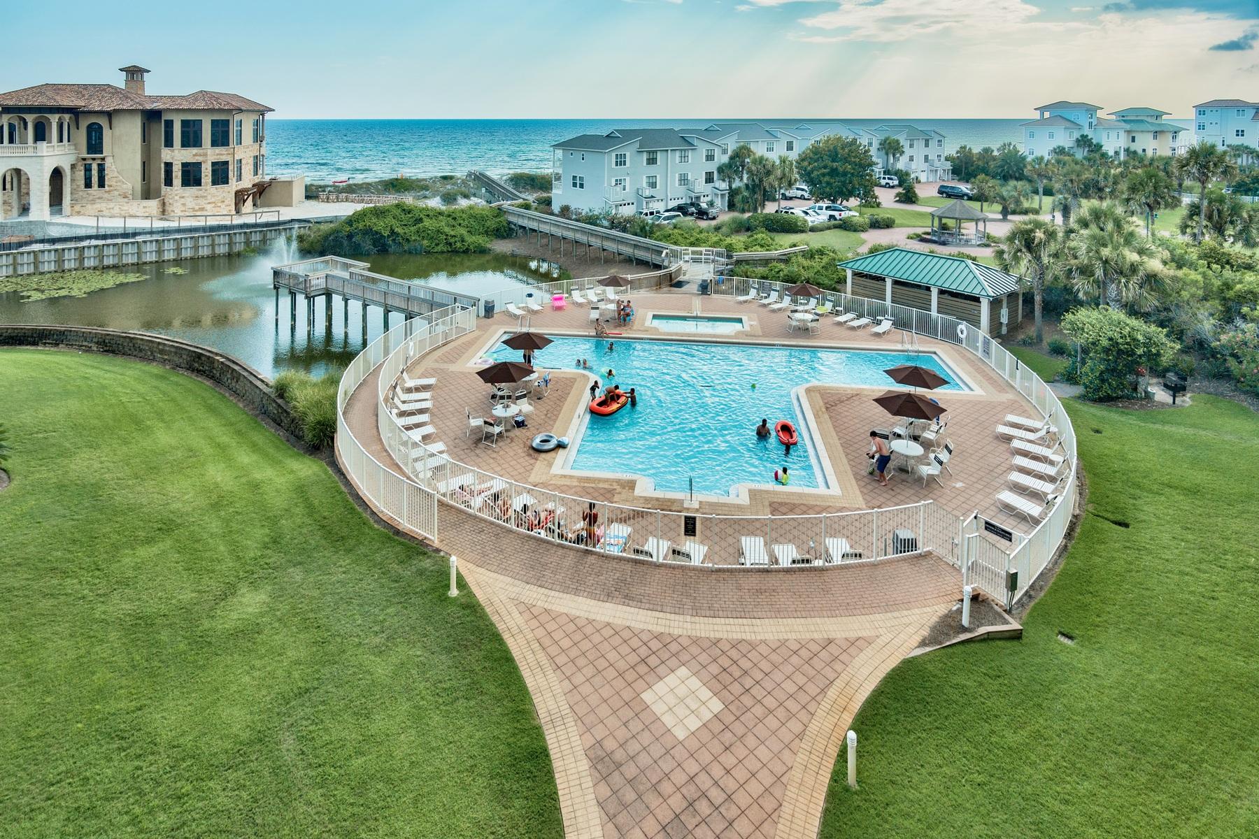 Deluxe top floor, never rented 4 bedroom plus 4 bathroom condominium situated perfectly in the center of the building at the prestigious property of San Remo! Greater than 2,300 square feet of seaside extravagance with a toes-in-the-sand locality on the renowned beaches of 30A. This beautifully laid out condo is one of a kind, no other condo in this complex has the same floor plan which is optimum for a primary, second home or vacation rental. Two master suites include his/hers walk in closets, double vanity, full size laundry room, and luxurious travertine tile throughout main living areas. An expansive 4th floor balcony offers the best Gulf views, breezes, and sunsets from all angles, not to mention the living room, dining room, and 3 of 4 bedrooms have entry to the gorgeous cony. At San Remo there are only 32 units total, offering a low density ultra private feel accessible via the secure gated entrance, along with a sparkling Gulf side pool and easy beach access.