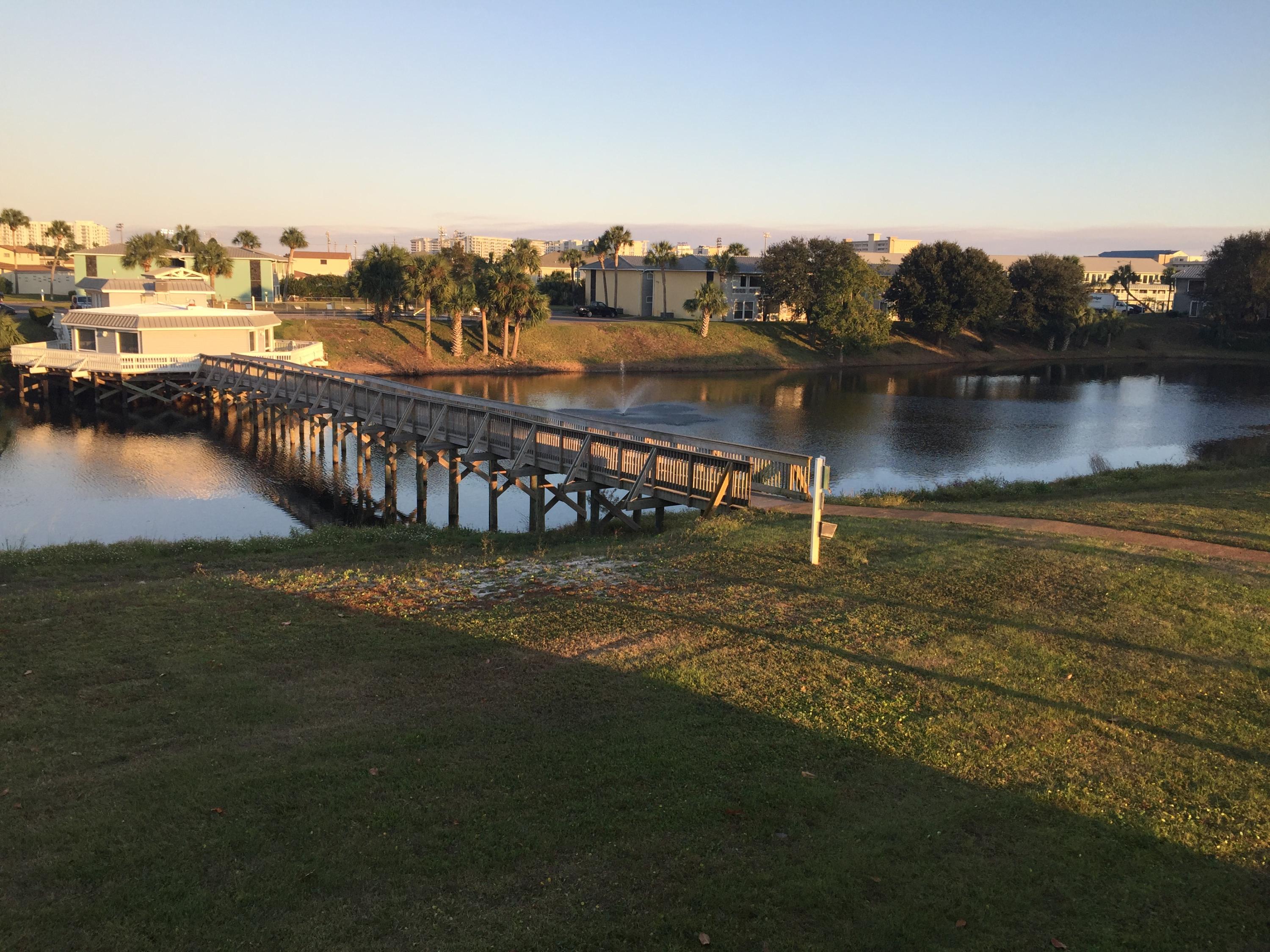 Great second floor condo overlooking the pond and furnished with all appliances including a washer & dryer.
Part of the balcony has been converted to a dining room giving you great views. Gulf Terrace is convenient to all Destin has to offer, plus the great amenities of Gulf Terrace including 3 pools, tennis and basketball courts, and a 20 acre lake with fishing pier. Walking distance to the beautiful beaches. No pets. Water, trash, and basic cable included.