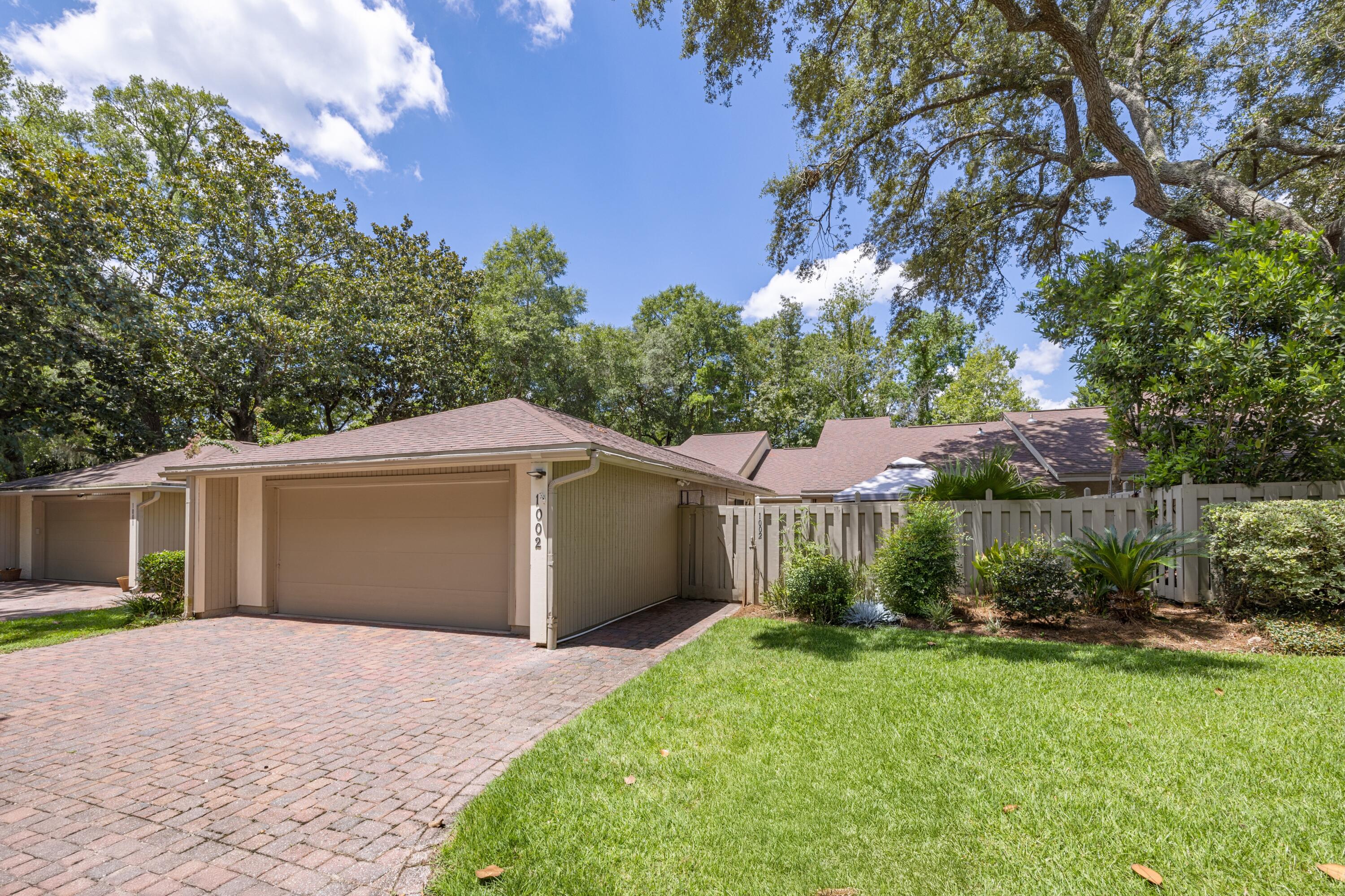 Back on Market! Updates: Water Heater, LVP flooring, New Paint & Light Fixtures. Enjoy optional Bluewater Bay membership and access to tennis, golf, boating, pickleball and more. This single-story patio home offers three spacious living areas and a private courtyard with a gazebo -- perfect for entertaining or relaxing outdoors. Vaulted ceilings create an open, airy feel in the main living spaces. The home includes brand-new appliances (refrigerator and stove/oven), a 2-car garage, and two bedrooms that open to their own private outdoor living areas -- ideal for quiet mornings or evening unwinding. Some owners turned the sun room into a 3rd master suite. boundless capabilities await you! Excellent opportunity for downsizing, investors or first-time buyers. Schedule your appointment today!