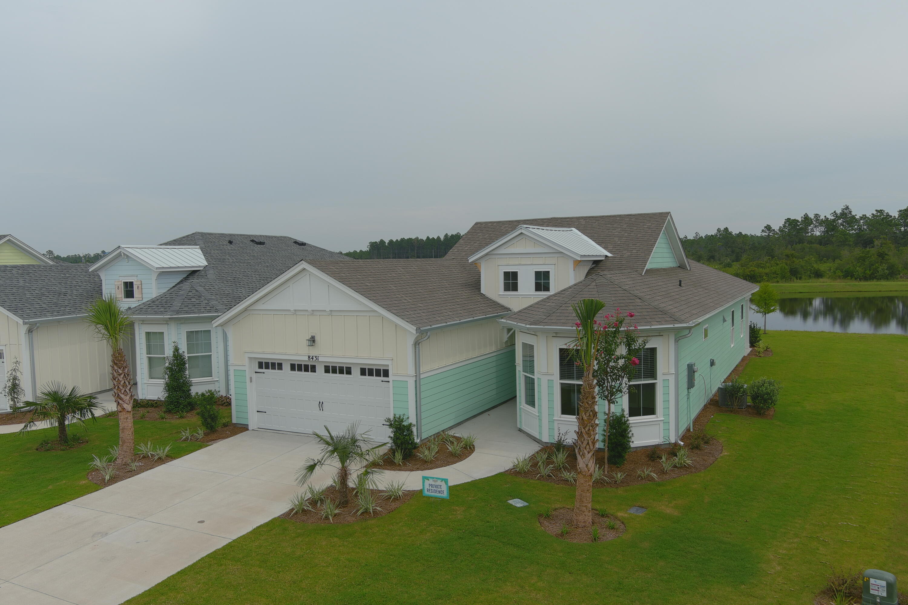 New To Market Margaritaville Latitudes at Watersound. ''Hammock Bay Model'' No waiting - Move In Ready! 2 Bedroom, Den / Office, 2.5 Baths, 2 Car Garage, with a private covered lanai (235 SF) overlooking a premium private pond view lot. Approximately 2110 SF. Plenty of room for a pool. Home includes all appliances to include washer and dryer. 55 plus community. Buyer or Buyers agent to verify schools, HOA fees, and specifications. Its always 5 O Clock here in Latitudes!
