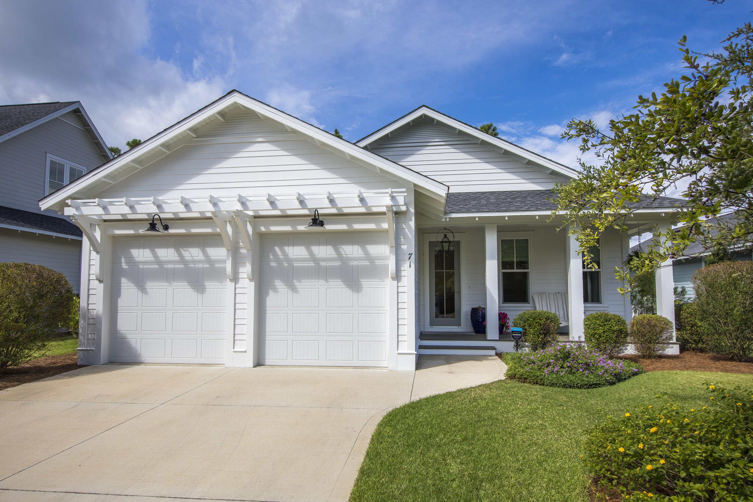 Welcome to 71 E Sandlefoot Lane. This beautiful home is located in the back portion of the Pathways of Watersound Origins, which means no thru traffic of any kind! The original owners spared no expense during construction equipping this home with Medallion wood floors, shiplap in the family room, foyer and kitchen island. The open floor plan will truly make you feel at home as soon as you walk through the door. There are 3 bedrooms and 3 bathrooms along with an office that could be your 4th bedroom. The little details are found throughout as you notice custom window treatments, air purifier system, and the beautiful fireplace in the family room. Take a short walk following the path directly behind the house to the community pavilion to enjoy golf, tennis, pickleball, and swimming.