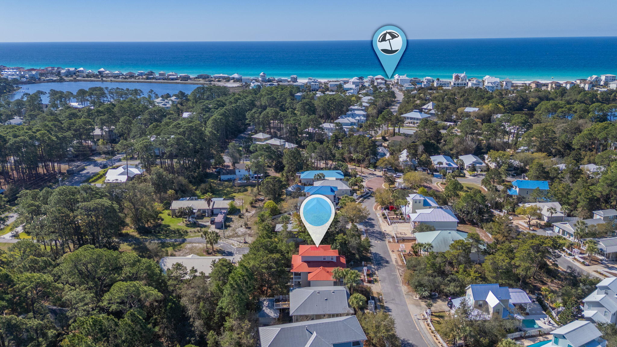 Phenomenal location, just ½ mile to the beach!  This pristine 3-level, fully furnished home has a large front porch, and offers exceptional flexibility with two separate living areas, making it ideal for multi-generational living, or work-from-home needs! The main living level features a large, open kitchen with stainless steel appliances & breakfast bar. There is a large dining area, and spacious living room with double doors leading to an oversized screened-in balcony overlooking the amazing fenced backyard. Upstairs, the primary suite includes an ensuite bath and sitting area. The lower level offers two  bedrooms and full bath, a second living area, laundry room and access to a covered patio, providing excellent separation of space and privacy, plus a one-car garage & circular drive!