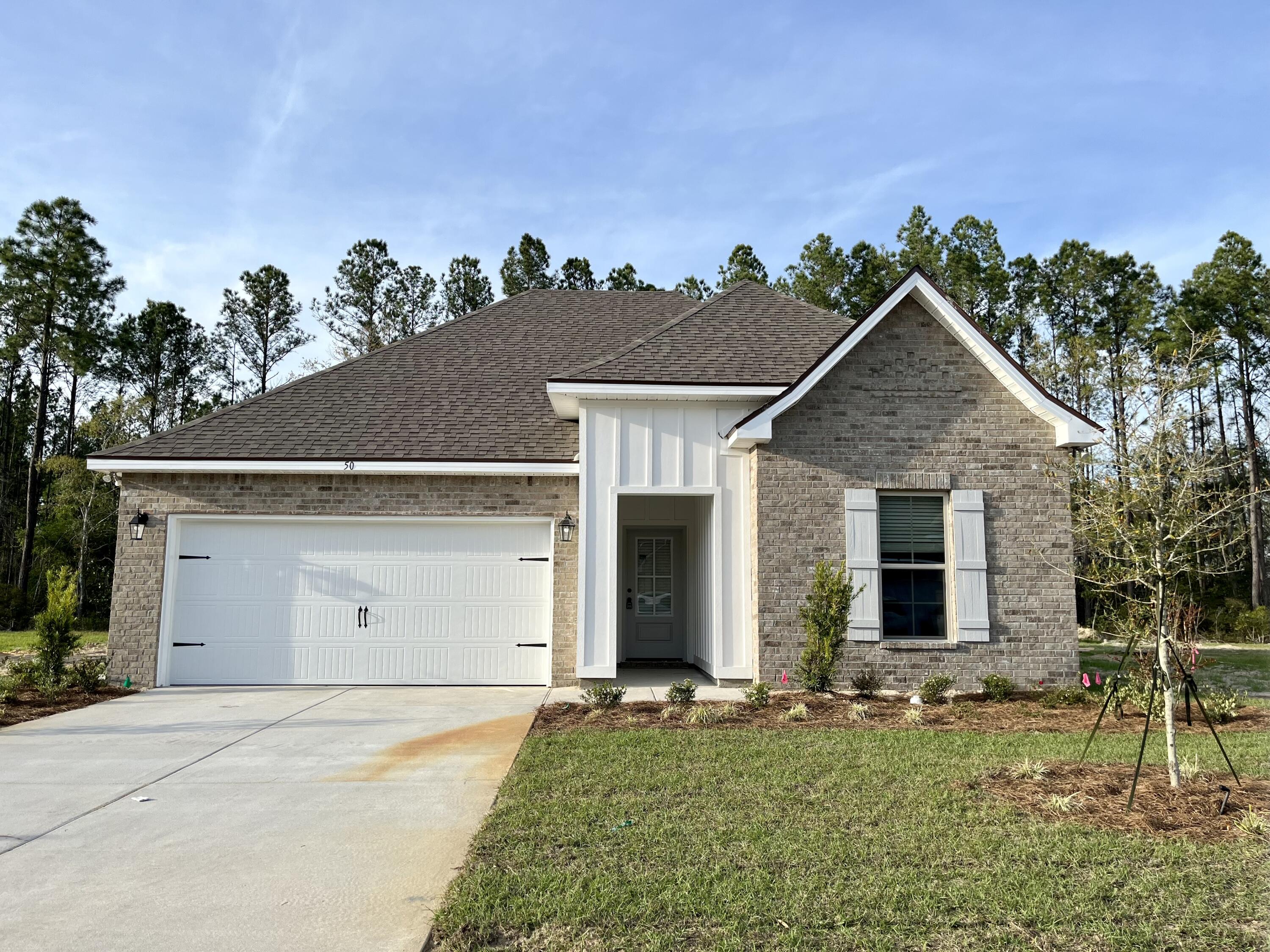 The TRILLIUM IV G in Moonswept at Hammock Bay community offers a 3 bedroom, 2 full bathroom, open design.  Upgrades added (list attached).  
Features: double vanity, garden tub, separate custom tiled shower with frameless door, and walk-in closet in the master suite, master closet opens to laundry room, covered front and rear porches, crown molding, recessed lighting, kitchen island, walk-in pantry, undermount sinks, framed mirrors, smart connect Wi-Fi thermostat, smoke/carbon monoxide detectors, landscaping package, architectural 30-year shingles, flood lights, and more!
Energy Efficient Features: water heater, kitchen appliance package with electric range, vinyl low E windows, and more!