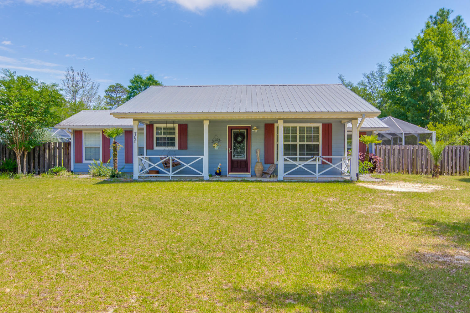 This Country Cottage shows so much than it appears! This would be an ideal home for a larger or extended family. It could also be utilized as a ''In-Law'' suite or Rental suite. This spacious home home features a stunning chef's kitchen with an island cooking area and two refrigerators and beautiful hardwood flooring. The master suite includes a private bathroom and laundry room. This split level floor plan offers a bonus area with a game-room, two additional bedrooms, a private bath and it's own laundry room. Step outside into a luxurious courtyard with an enclosed pool area complete with outside shower and cabana room with yet another private bathroom. A detached three car garage and a extra bay offers ample parking or storage space. Bring your imagination and come explore the possibilities this unique property has to offer!
