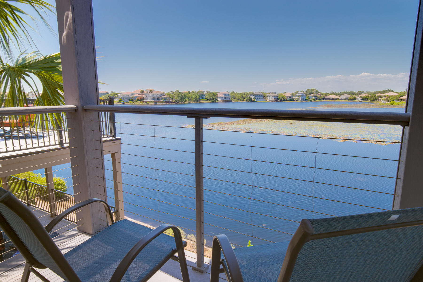 Don't miss this opportunity to own one of the most versatile and profitable vacation investment properties in Destin. With a gross rental projection of over $71k/yr., Destiny Beach Villa #22 can be used as TWO 2 bed/2 bath units or a 4 bed/4 bath beach retreat. This Villa sits near a beach access tunnel allowing you to avoid crossing street traffic on your way to the beach. Enjoy an easy walk under the street to the gorgeous white sand beach then come home to views of the serene 4 Prong Lake. Whether you want to play on the beach, lounge by the pool, fish, golf, shop, eat, drink, or just lay low... you don't have far to go. The Mid-Bay Bridge, Destin Commons, Harborwalk Village, and even Silver Sands Outlet Mall are just minutes away. Call today and schedule a private showing!