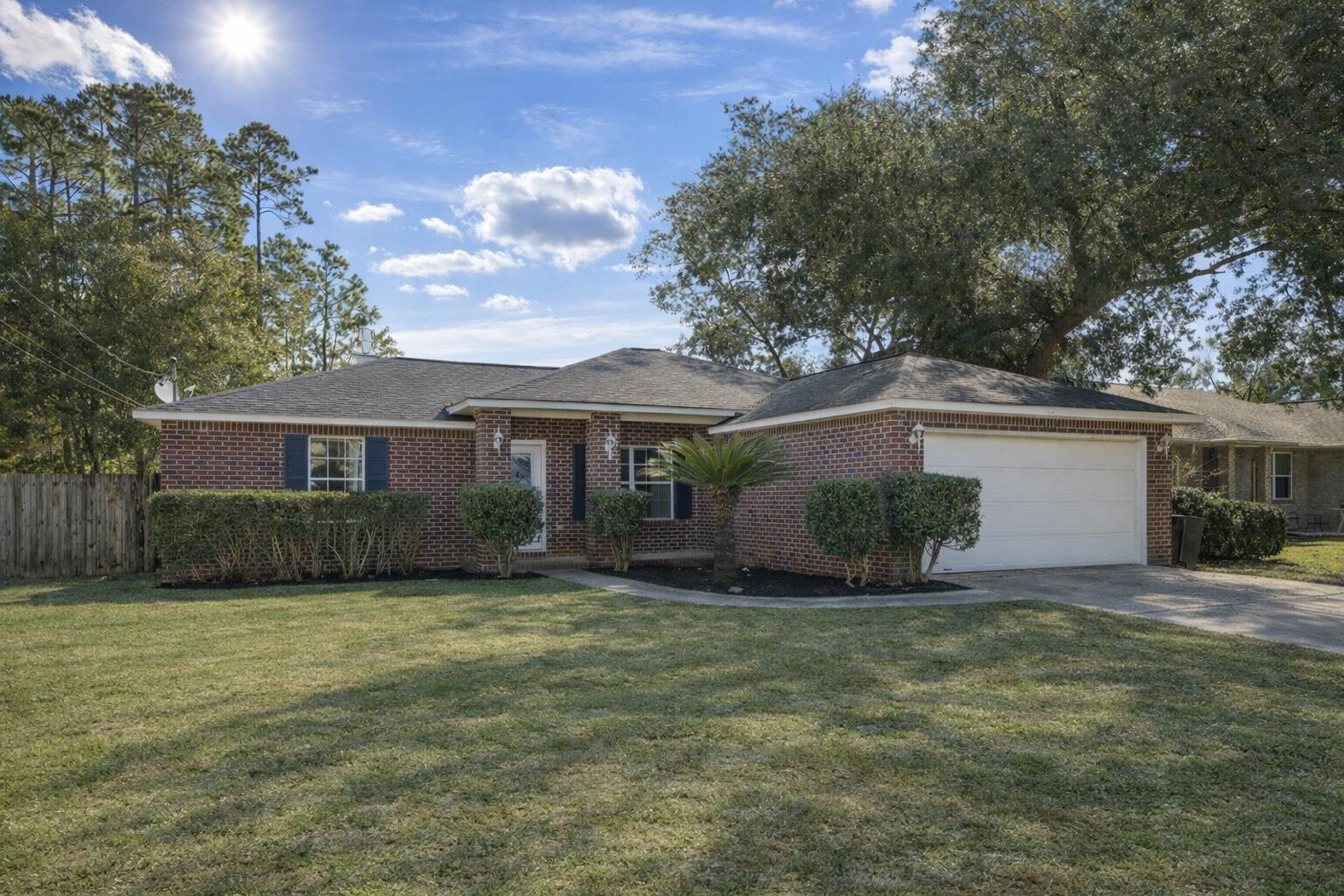 Welcome to Hidden Estates -- a true hidden gem!

Tucked away just off Eastbay Boulevard, this quiet neighborhood offers a peaceful circle-in, circle-out layout with no cut-through traffic, complete with streetlights and speed bumps for added comfort and safety.

Roof - 5 years, HVAC - 2 years, & the water heater is 6 years old. The home is conveniently located just up the road from a gated private K-12 school and approximately 15 minutes from the beach, offering the best of both everyday convenience and coastal living. The property is also located in a no flood zone, adding peace of mind.

Step inside to find plenty of natural light throughout, enhancing the semi-open layout and creating a bright, welcoming atmosphere. The primary bedroom is thoughtfully positioned on its own separate side of the home, offering privacy, while two spare bedrooms are located near a second full bathroom.

A dedicated laundry room sits just off the garage entrance, providing a practical everyday drop zone. The home features a cozy fireplace and a separate breakfast nook overlooking the backyard, perfect for morning coffee or casual dining.

Flooring includes luxury vinyl plank throughout the main living areas, tile in the wet areas, and carpet in the bedrooms. The kitchen offers Formica countertops, and all appliances convey, including a stainless steel refrigerator and dishwasher, with a white stove and hood vent.

Outside, enjoy a fully fenced backyard with brand-new sod recently installedplease allow a little time for it to mature into its full green beauty. The front yard is nicely manicured with trimmed bushes and fresh mulch, adding to the home's curb appeal.

At an exceptional price point, this is a rare opportunity to own a brick home under $300,000. With comparable homes selling well above $325,000, the seller has priced this home intentionally and is motivatedmaking it a smart opportunity for today's savvy buyer.

A wonderful starter home offering value, functionality, and locationHidden Estates is ready to welcome you home.