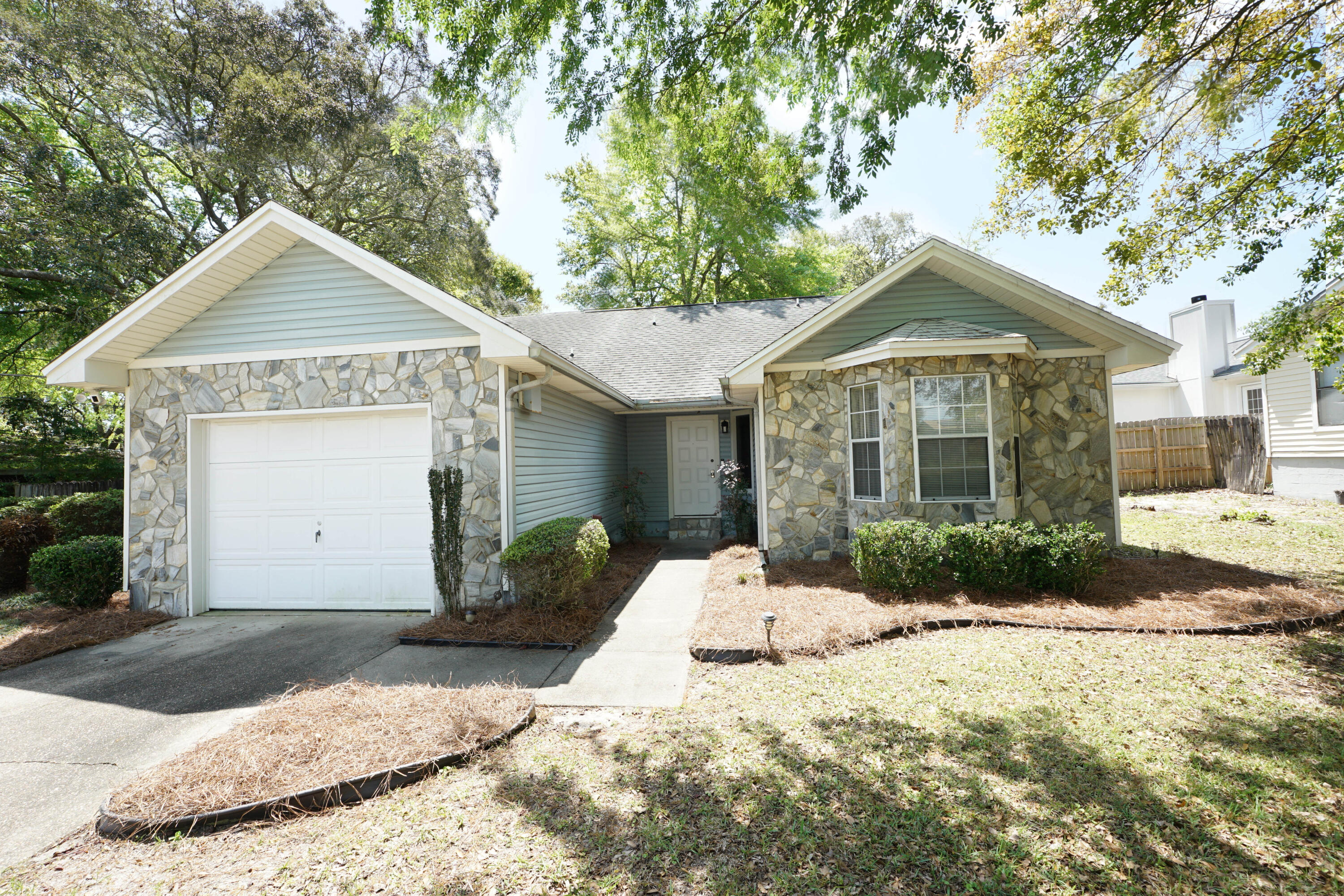 Adorable, well-maintained home in Shalimar, FL with 3 bedrooms, 2 bathrooms, and 1292 square feet plus a Florida room.  Seller to replace roof with 30 year dimensional shingles with acceptable offer! This home is located within minutes to the bases, white sandy beaches, and restaurants! A new Rehem HVAC was installed in 2023! The hot water heater was replaced in 2023! The refrigerator was purchased in 2020. NO HOA and NO Flood Insurance required. Boat, RV, and trailer parking allowed! Enter the home into the foyer an into open floor plan with the living room opening to the kitchen and dining room! The kitchen has a raised bar that seats 3-4 guests and plenty of counter space for prepping!  In addition there is a side by side Black Refrigerator with icemaker and a slide in stove.  The living room has a fireplace and large windows to allow natural light to abound! The primary bedroom has an ensuite bathroom There are also two guest bedrooms and a guest bathroom. There is a Florida Room 160 square feet. The backyard is fenced and also has a nice shed for extra storage!  There is a sprinkler system and a gutter system! There is also a one car garage and extra parking in the driveway. The location of this home is perfect if you need to be close to the base or the beach! Shalimar Fl has a public beach on Meigs Drive and a public park on Shalimar Dr. Buyer to verify all dimensions and information.