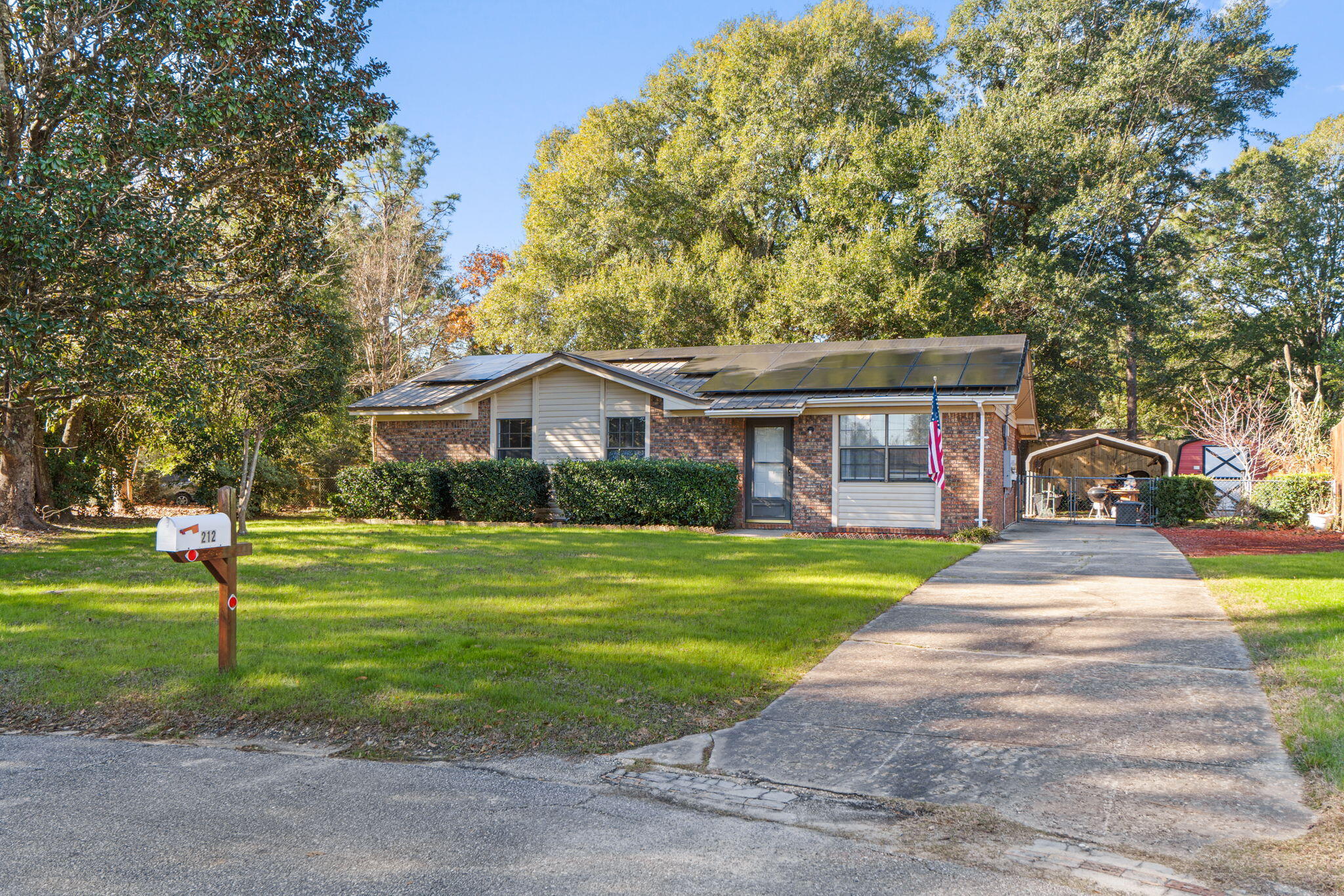 This charming brick home offers durability, style, and energy efficiency. Featuring a metal roof and solar panels that the seller will pay off with an acceptable offer, this property is designed for long-term savings and peace of mind.
Step inside and enjoy the natural light that floods the living area, creating a warm and welcoming atmosphere. The home includes an enclosed back porch with an attached large laundry room, perfect for extra storage or hobbies.
Outside, your private backyard oasis awaits! The new privacy fence surrounds a beautifully landscaped yard and includes two powered sheds, ideal for a workshop or additional storage. Whether you're relaxing in the garden or hosting weekend gatherings, this outdoor space is a true retreat. Call and schedule your showing today