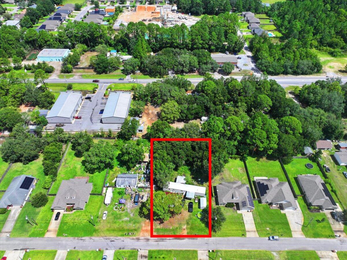 *PLEASE DO NOT GO THE PROPERTY WITHOUT AN APPOINTMENT. IT IS OCCUPIED BY A FAMILY* 
Located in a highly sought-after neighborhood in Navarre, FL, this large lot presents a fantastic opportunity for new construction or investment. Surrounded by homes that have historically sold for over $400,000, this property offers strong potential for future value growth.

The lot currently features a 1992 mobile home and a 1994 garage, with full utilities hooked up and in livable condition. While these structures are not factored into the list price, they can either remain with the property or be removed by the seller based on buyer preference.

Don't miss this chance to build your dream home or capitalize on a solid investment in one of Navarre's most desirable areas.