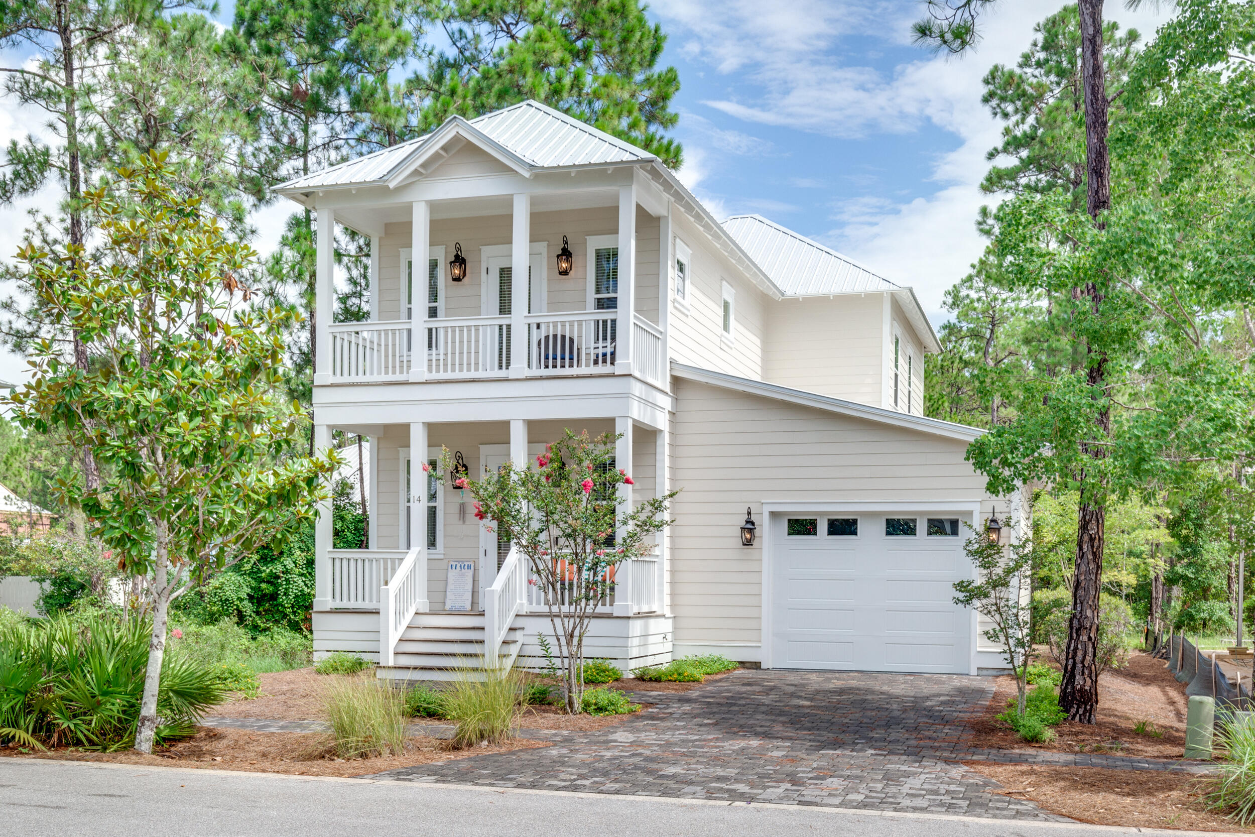 Tucked away in the gated community of Hidden Grove in Santa Rosa Beach, 14 Crepe Myrtle Lane offers the perfect blend of comfort, style, and convenience. This 4-bedroom, 2.5-bath home is ideal as a primary residence or a relaxing second home near the coast. Step inside to discover an inviting open-concept floor plan with 10-foot ceilings and hardwood floors throughout. The spacious living and dining areas flow seamlessly into the kitchen, which features granite countertops, stainless steel appliances, under-cabinet lighting, a stone backsplash, and a large pantry. The first floor also includes a versatile bedroom that works well as a home office or guest room, along with a half bath, under-stair storage, and access to the attached garage. Upstairs, you'll find two comfortable guest bedrooms, a full bathroom with a shower/tub combo, and the primary suite. The spacious primary suite is filled with natural light and offers access to a private balcony, along with an en-suite bath featuring a walk-in shower. Hidden Grove offers a gated entrance and a large neighborhood pool. You'll love the locationjust minutes from Choctawhatchee Bay, Sacred Heart Hospital, Grand Boulevard, Sandestin, and the stunning beaches of South Walton. If the buyer chooses to use the seller's preferred mortgage broker, they will receive a lender credit equal to 1% of the loan amount, which can be applied toward closing costs or an interest rate buy-down.

**Buyer to verify all information deemed important.**