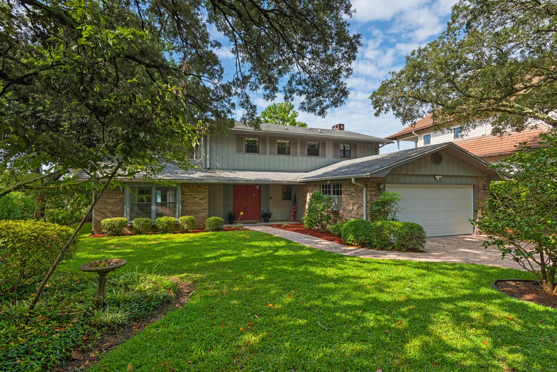 ORIGINAL OWNER WATERFRONT ESTATE SITUATED ON OVER HALF AN ACRE LOT WITH MATURE TREES AND BEAUTIFULLY LANDSCAPED LAWNS LOCATED IN THE HEART OF FORT WALTON BEACH. Step into the foyer to find a high volume ceiling with a chapel window, open staircase and parquet flooring throughout. Formal living room with bay window and French doors that lead out to a private deck. Formal dining room has a large picture window. Gourmet kitchen with lots of wood cabinetry and a built-in wine rack, granite counter space which includes a large center island with beamed pot and pan rack above the gas stove, double oven and a breakfast bar. Cozy family room that's open to the kitchen and has a gas fireplace and a office convenient office area that can be closed off. You will love entertaining in your GREAT room with incredible water views, 18ft high cathedral ceiling and windows that span from the floor to the ceiling, grand gas fireplace with mantle, custom built wet bar with ice maker and mirror accent with shelves for glassware.  Master bedroom has a walk-in closet and a sitting area with a bay window overlooking the water.  Master bath has double vanities with granite countertops, new vanitiy, separate shower and a tub/shower combo.  There is a door that leads out to an amazing waterfront octagon spa room that's heated and cooled for your year round enjoyment.   Second floor has a separate master bedroom with sliding glass doors that access a balcony that overlooks the great room.  2nd master bedroom has a private bath with a custom walk-in closet and double vanities.  Three additional bedrooms all with parquet flooring and sliding glass doors that lead out to the balcony too and a full hall bath also has double vanities.  
Don't miss the 23ftx17ft bonus room that can also be used as a bedroom or playroom/game room upstairs.  Home has a laundry shoot from the upstairs to laundry room downstairs, complete with a utility sink and built-in cabinets.  The deck area is the perfect place to relax or dine and entertain family and friends overlooking the water.  From the backyard you can easily access the 36ft x 33ft full basement under the house with a golf cart size roll up door great for storing anything you can imagine.  Backyard has a smaller fenced in area perfect for small children and pets.  The beautiful landscaped yard like your own private park complete with everything living on the water has to offer including a dock with power and water and a boat slip.  There are so many extras to list we have added a feature sheet.  Close to shopping, restaurants, schools, both Hurlburt and Eglin AFB and the beaches.  Call us today for your own private viewing.....