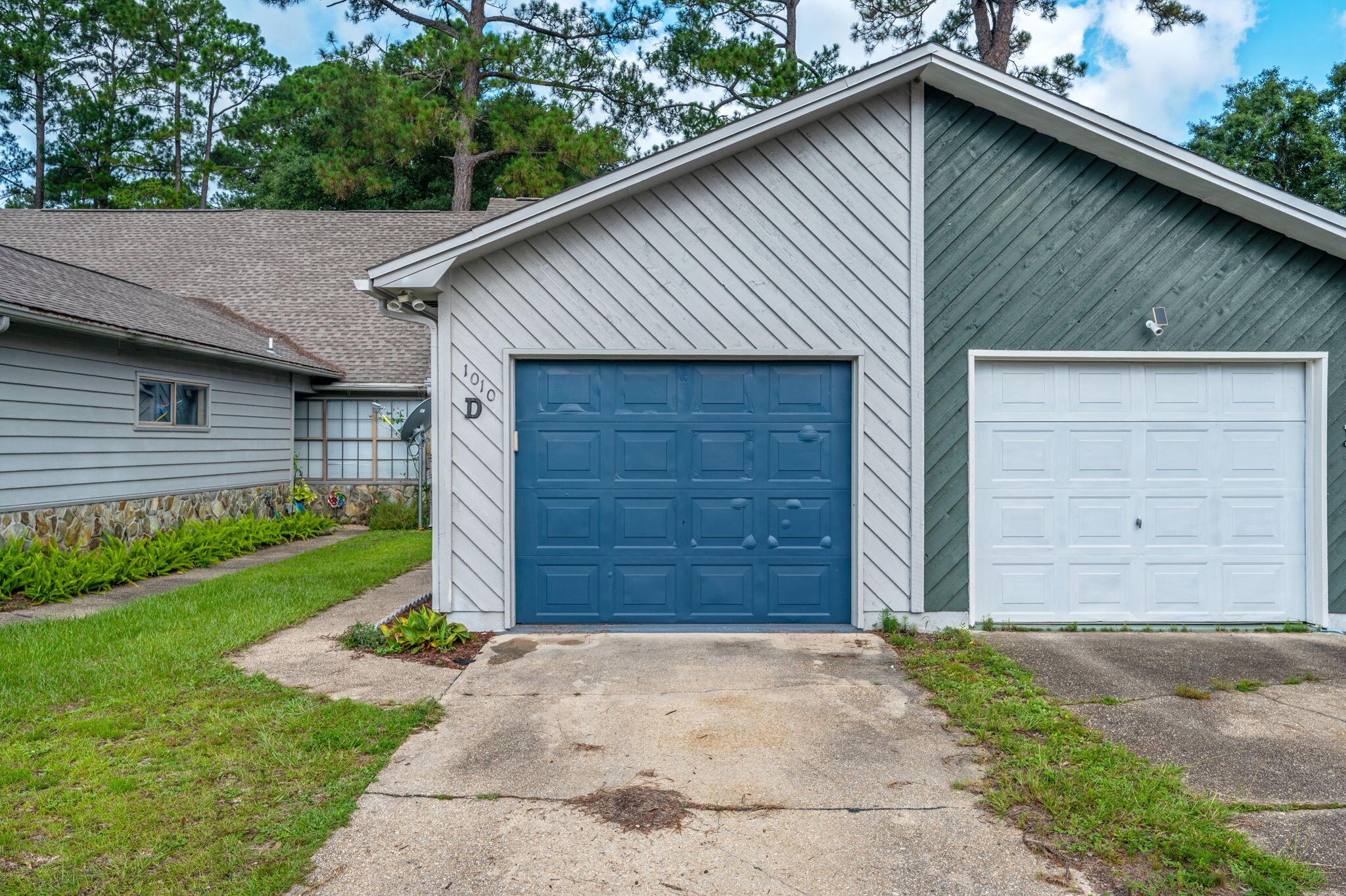 Welcome home to this beautifully maintained townhome, ideally situated in a prime central location in Fort Walton Beach. Step inside to soaring cathedral ceilings that create a bright, airy ambiance from the moment you enter. A tiled entryway leads into a spacious living room, perfect for entertaining or relaxing in comfort. The separate dining area flows seamlessly into the updated galley kitchen, complete with modern finishes and direct access to the fully fenced, low-maintenance backyard—ideal for grilling and weekend gatherings. Upstairs, carpeted stairs lead to generously sized bedrooms, all thoughtfully located for privacy. The master suite features it's own sitting area with French doors and a loft area that overlooks the living space below, adding architectural interest and an open feel. Additional highlights include a single-car garage with washer and dryer hookups, and convenient access to nearby shopping, dining, and beaches. Don't miss this opportunity to rent a spacious and stylish townhome in one of Fort Walton Beach's most sought-after areas!