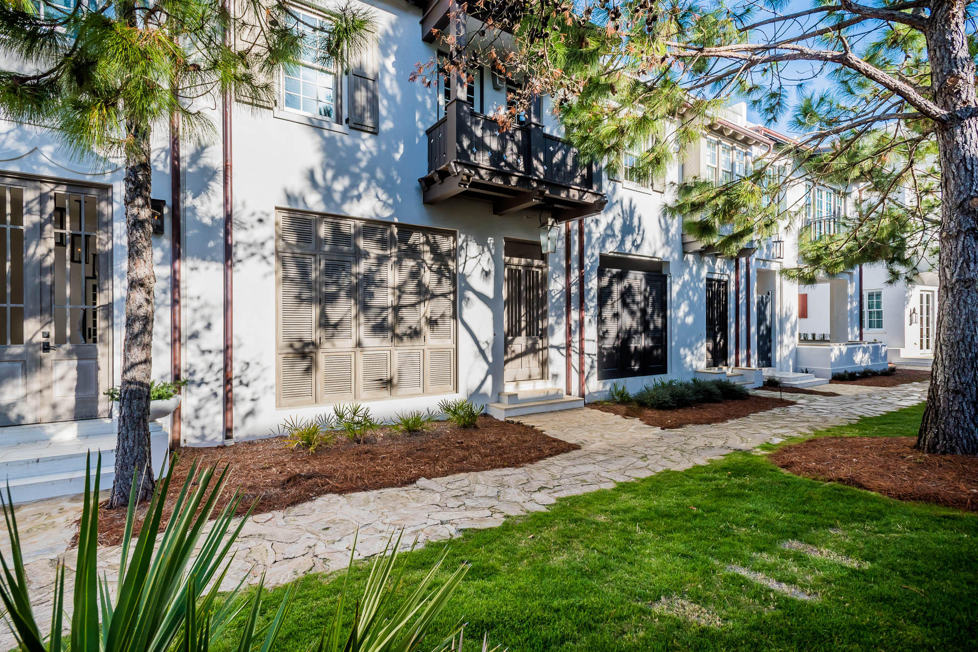 This stunning 2,619 square foot home, designed by Architect T. S. Adams Architecture Studio, is located on the famed Arboleda Park. Nestled amongst the emerging Town Center, Caliza Pool & Restaurant, and the up and coming 15,000 square foot Alys Beach Fitness Center campus scheduled to be completed Spring 2019 place this home in the heart of Alys Beach.
The home features 3 very generous bedrooms, 3.5 baths plus a double-bunk room to sleep 4 children. The courtyard loggia opens to Arboleda Park allowing for cooling breezes and the tranquil sounds of nature. Additionally, the home offers a two-car garage.
The home is offered inclusive of furnishings professionally designed by Brad Ramsey Interiors making the purchase effortless. All appointments of the interiors are first cla The great room opens to a courtyard aligned with a fountain that connects to a covered outdoor living room with fireplace, flat screen TV and grill which overlooks Arboleda Park.  This layout allows for entertainment at its best.  

The courtyard loggia shutters close for privacy or open to absorb the serene landscape of the Arboleda Park.  The second floor has a grand master bedroom overlooking Arboleda Park, two generous guest rooms with a living area connecting to the double-bunkroom.  

The upstairs living area is perfect for movies or having a second common area for the children to sprawl.  This home is very livable having spaces for all occasions.  Entertainment or extreme privacy.  This home is a must see.