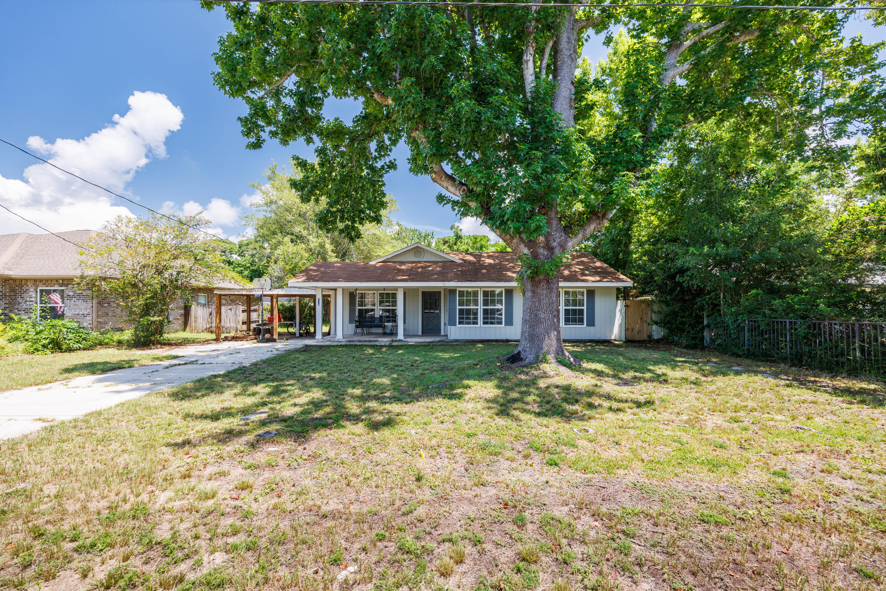 Charming 3-bedroom, 2-bath home in Wynnehaven Beach Estates! Step inside to discover open living with beautiful floors and well-appointed dual living spaces, ideal for both relaxing and entertaining. The bright kitchen boasts abundant cabinet space, flowing effortlessly into the dining area. The primary suite offers a peaceful retreat with a roomy walk-in closet. Outside, enjoy a large backyard with plenty of room for pets, play, or entertaining. Located just minutes from Hurlburt Field, the beaches, and everyday conveniences, this move-in-ready home combines comfort, charm, and coastal convenience. Don't miss your opportunity to make it yours!