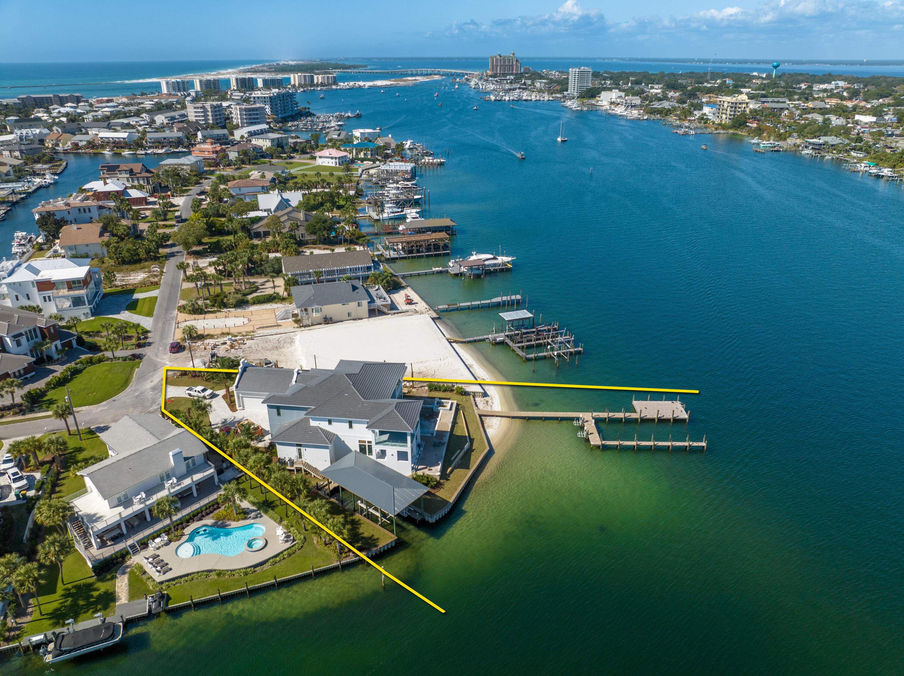 Spectacular New Construction on the Scenic Harbor of Destin, Florida!
531 Norriego Road epitomizes perfection, aligning the superiority of not only one of the finest lots on deep-water in the exclusive beach and yachtsman's enclave known as Holiday Isle, but impeccable new design and construction providing immense structural integrity, innovative and updated building technologies, and magnificent windows and doors providing the most stunning view corridors in every direction and from every room!  The new dock will accommodate massive yachts, while the inset slip will accommodate a companion vessel of impressive beam and length as well.  While the moorings in your backyard secure your marine vessels, your four-car garage will protect your coveted car collection! The floorplan was... carefully planned to optimize not only the breathtaking views, but to also integrate practicality of functional living.  Every interior and exterior square foot of this impressive waterfront estate will be thoroughly enjoyed.  The outdoor experience, especially while on the two expansive covered balconies will be accentuated by the ambience of the gorgeous pool and hot tub, all strategically oriented to enjoy your 162' of pristine waterfrontage and beach.  Please inquire for further details and the latest construction updates.  Showings are by appointment only as this listing involves an active worksite.  There shall be no trespassing on the subject worksite at any time without the listing broker accompanying all showings.  Showing requests require a minimum of (48)-hours of advanced notice.  All prospective buyers and attendees must wear hard-hats throughout the duration of every showing while on property, which the listing broker will provide before entering onto the property.