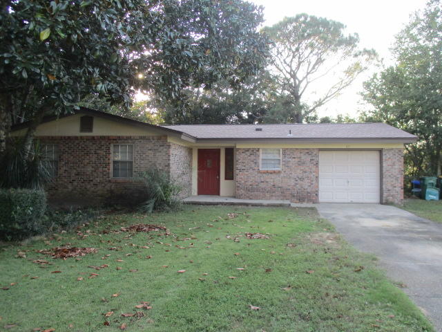 THE HOUSE IS ON A LARGE CORNER LOT, OVER A QUARTER OF AN ACRE, CONVENIENT TO EGLIN AFB AND FWB. 
Updated kitchen.  Fresh paint and New flooring throughout. LVP in living, hall, baths and kitchen, and carpet in the bedrooms. and the tub is refinished in the full bath .Oversized one car garage for your use. Laundry is located in the garage.  There is a 14x15 rear concrete patio for your entertaining. Lawn pump and sprinklers