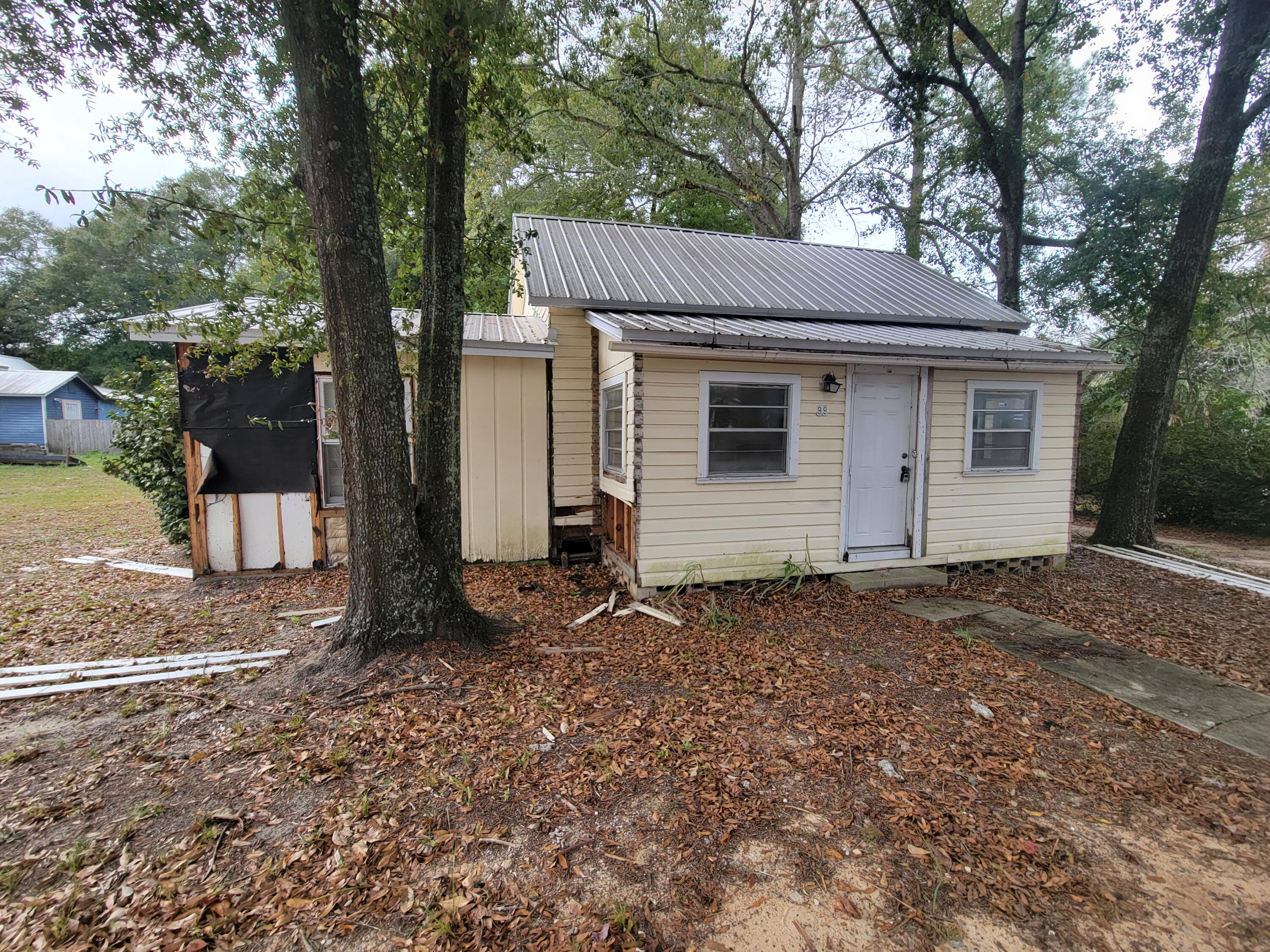 Great little rental unit for some investor to fix up and rent.  Past rental history tenant was there for ten years.  Needs new kitchen floor and cabinets.   A/C appx. 3 yrs. old.  New front porch has just been added-on in 2025.  Needs floor covering and water heater and commode.  Great little fixer-upper.  In walking distance of the lake yard and restaurants and shopping.    CASH SALES CONTRACTS ONLY.
