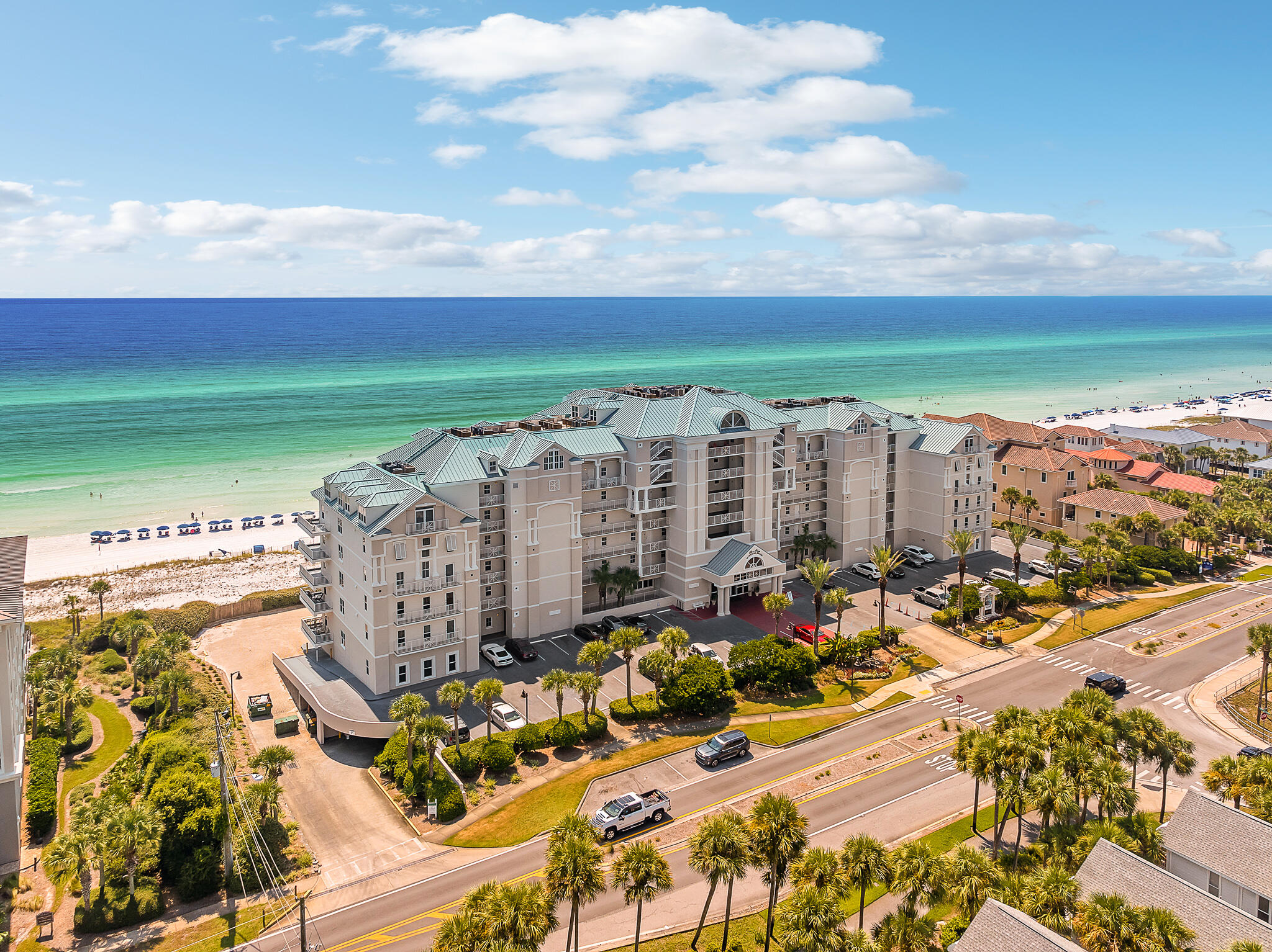 This penthouse epitomizes upscale coastal living, where spaciousness, luxury, top-notch amenities, and awe-inspiring surroundings converge to create an extraordinary residence. Its distinctive three-story layout, complete with a private elevator, distinguishes it as an exclusive residence, evoking the ambiance of a private home rather than a typical condominium. The unit has been impeccably maintained, having served as the seller's primary residence, ensuring a high standard of quality and comfort.
A recent renovation in 2023 brought modern amenities and design elements into the penthouse, including a wet bar and kitchenette adjacent to the primary suite. The kitchen has been thoughtfully redesigned, with a sitting area on the island, fostering a space for socializing while preparing meals. Its open layout seamlessly connects to the spacious living area and generous dining space, creating an ideal setting for hosting gatherings and entertaining guests.
The penthouse's interior boasts an expansive 4,700 square feet of living space, offering ample room for comfortable living. With seven bedrooms and 5.5 bathrooms, it comfortably accommodates both families and larger groups. The main suite, spanning the width of the second floor and featuring a sitting area, offers a private beachfront balcony that serves as a tranquil haven for enjoying your morning coffee while immersed in the coastal serenity. The main bath includes a large tub and a separate shower with dual vanities. Moreover, this luxurious suite includes an adjoining wine bar and a kitchenette, enhancing the convenience and elegance of this exceptional space.
Positioned within the Inn at Crystal Beach, a low-density, full-service resort, residents can indulge in an array of luxury amenities. These amenities encompass a heated Gulf-front pool, beach service, an on-site restaurant with a bar, a fitness center, a 24-hour service desk, and private beach access. The penthouse's location within this resort adds to its appeal, offering a truly unparalleled coastal living experience.