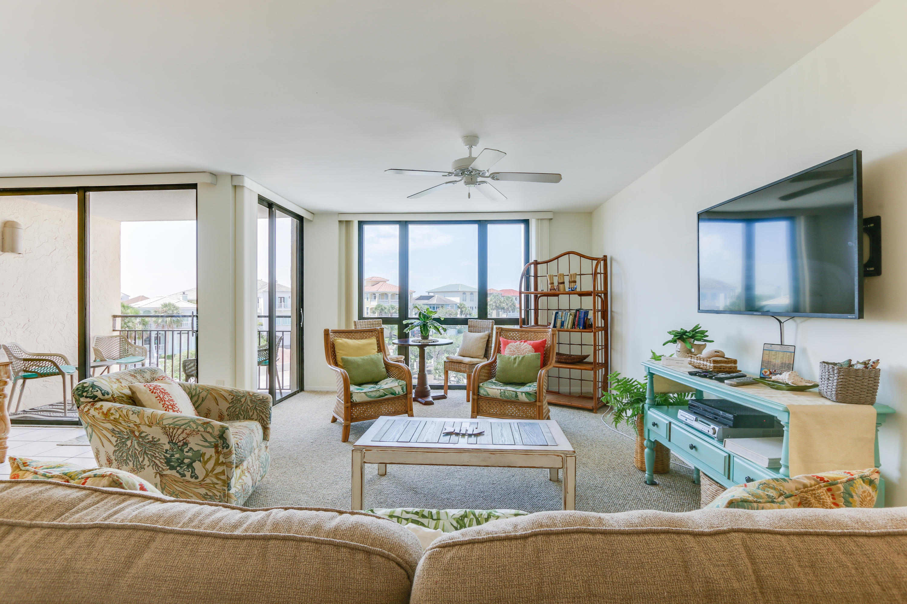 You will be so excited to call this condo your beach getaway! This is a large 2-bedroom condo with 1,262 sq. ft. A wall of windows makes the space bright and airy; the updated dcor and paint colors makes it feel incredibly comfortable. You will walk in & never want to leave.
The Enclave itself is incredible offering you a private gated beach access, Olympic sized swimming pool  heated seasonally. You will want to take advantage of bar-b-que grills, fitness area, tennis, community room, or simply walking on the amazing beach. Huge bonus  owners can have pets.
This unit, #402B, has a corner balcony with views of the Gulf of Mexico. Stainless Steel Appliances in the kitchen, a large master bedroom with full private bath end suite. The Family room is open and perfect for entertaining.