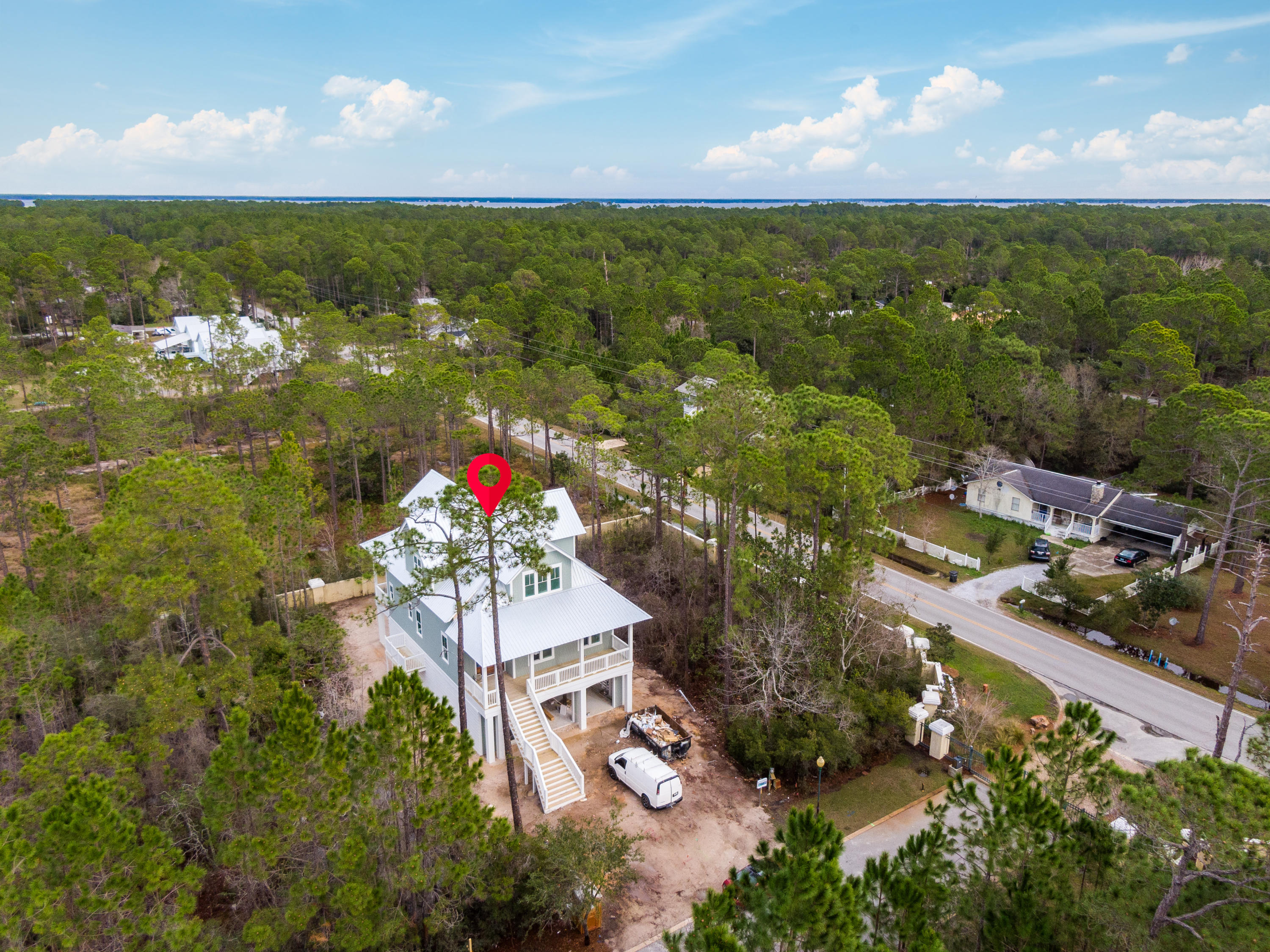 Just reduced !! Custom home in gated waterfront community of Cessna Landing.
4 bedroom, 3.5 bathroom custom home features an elevator accessible to all 3 levels. Other highlights include views of the Bay, community access to the bay and community pool. Upgrades galore, this home features 12 ft ceilings on main level and 10 ft ceilings on the top level. Ship lap siding, custom mahogany door, custom cabinets thru out, tiled showers with rimless glass in bathrooms, hardwood floors thru out, fireplace and more.
Additionally, this beautiful home features tons of oversized windows, decks, upgraded appliances, parking for 4 cars under in the garage and views of the Bay.
This is a must see home that will not last long.