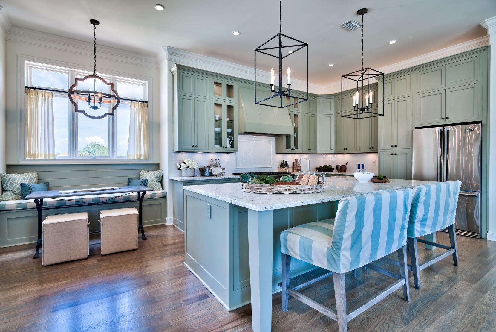 MUST SEE HOME in Destiny by the Sea!!!
Immeasurable time and effort were given to the redesign of this home with remarkable gulf views in Destiny by the Sea. Interior appointments by Leigh Ann Harris of Burrow Interior Design are both stunning and comfortably understated. Old South Homes was hired to bring this beauty back to life, with builder Andy Beno overseeing the renovations. In addition to completely rebuilding the front of the home, new front impact glass windows and doors that are hurricane rated were implemented. Newly installed Peacock Pavers run throughout the ground floor, while the curved staircase and second
and third floors are now encased with new white oak flooring. The ground floor includes two master suites with gulf views, private bathrooms and walk-in closets, in addition to a newly designed bunk room that sleeps 8 with its own private bath. The second floor living space was completely transformed into an open kitchen/dining/family room area that truly takes advantage of the wonderful views. Also on the second floor are an additional bedroom with a gulf view, a laundry closet and a full bath. The third floor has become a true master suite with a large bedroom overlooking the gulf and a luxurious
master bath finished in Calacutta Gold marble and high end fixtures.