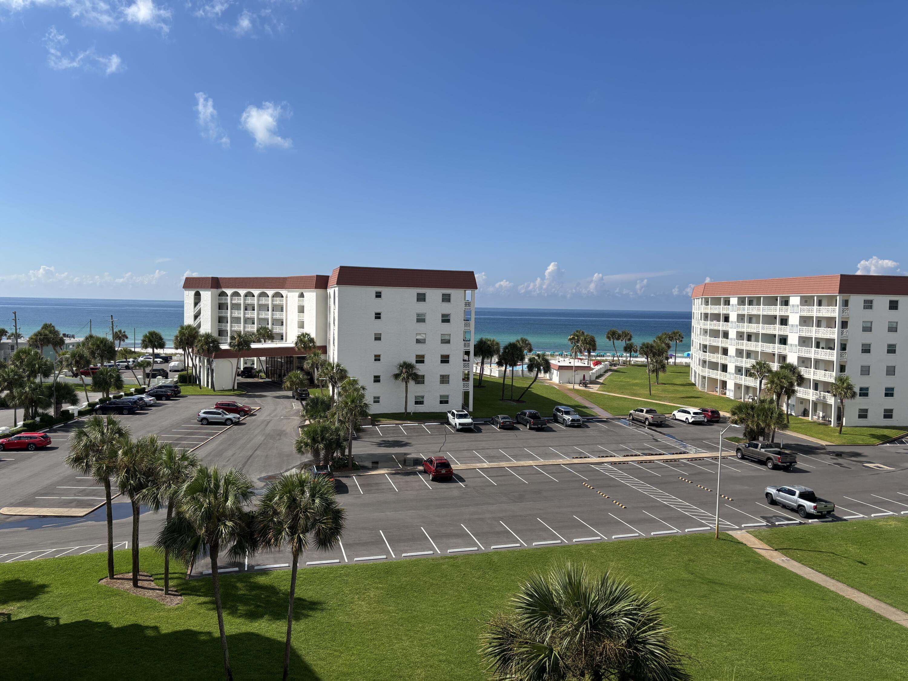Perched on the top floor this lovely condo has a great view of the Gulf of Mexico.  The remodeled kitchen opens up the floor plan and gives the condo an airy and inviting feel.  Tile and glass shower along with an updated vanity in the bathroom. All the popcorn was removed from the ceiling. You can make family memories and cash in $$$ on vacation rentals. With the sleeper sofa you can accommodate 4 people. Direct access to the balcony from the bedroom and living room. Located on 12 acres there is lots of green space and some of the least crowded beaches around.  2 pools, hot tub, sauna, tennis, pickle ball, basketball, and community grills are some of the fun amenities. Lots of exciting restaurants and attractions in the area. The condo is currently being refreshed  with a new door and  door frame on the balcony. New rollers on the Sliding glass doors, new fan , new tv.