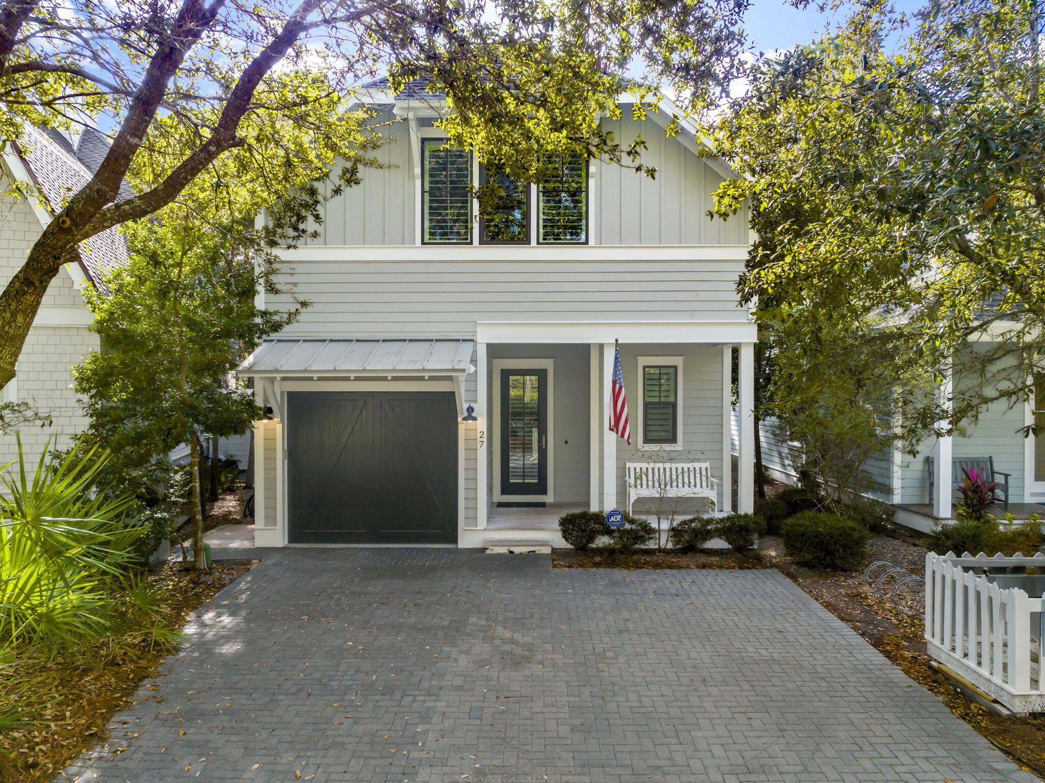 Watersound West Beach cottage located on Horseshoe Park! This charming home is perfect for those desiring a quiet and peaceful setting and offers 3 bedrooms PLUS built-in bunks, 3.5 baths, one car garage, open concept living, screened porch, and second level bonus living space that can be converted to a 4th bedroom. There are two master suites, one on each level, and the upper suite boasts a serene view over the park. Features of this home include hardwood flooring throughout, quartz countertops, wine cooler, custom white cabinetry, shiplap in hall/entry, 10' ceilings, and much more!  Enjoy your morning coffee on the screened porch on the park with no rear neighbors.  Home is being offered fully furnished and rental ready but is also perfect for a second home or full time living. Watersound West Beach is 30a's best kept secret for access to the most secluded and beautiful beaches on 30A and features a gated entrance, community pool/clubhouse, putting green, boardwalks for walking/biking, multiple parks, boardwalk to the beach with bike parking, and fitness center at Watersound Beach. The beach access through Deer Lake State Park is a perpetual easement so no customary use worries here! And no crowds! Live the beach life!!!