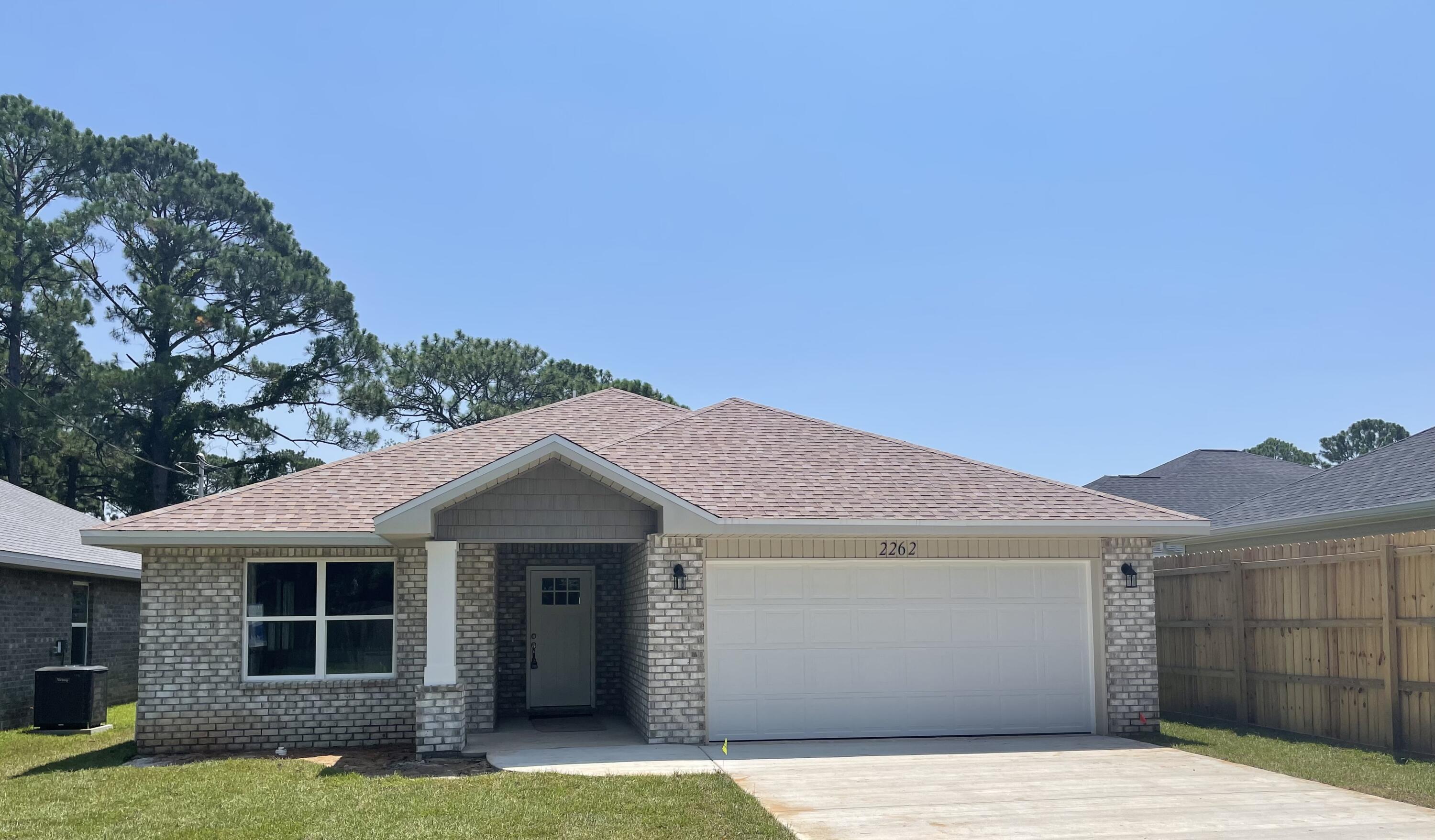 SELLER TO PAY UP TO $10K TOWARD CLOSING COSTS/RATE BUY DOWN w/ACCEPTABLE OFFER! 
BRAND NEW 2023 ALL BRICK HOME nestled on a peaceful end of street lot & near other 2023 homes. Upon entry thru a deco top glass front door you are welcomed into an expansive living & dining space accented w/crown molding, recessed ceiling & tasteful lighting throughout.  The KITCHEN is located in a cozy front of home corner & is topped off w/huge Sunny window! It boasts QUARTZ counters, large sink, White shaker style cabinets w/soft close drawers w/ ''coffee'' area counter cabinet, Stainless appliances, smooth cook top range, Built in Microwave, Long/Large eat up bar & Corner pantry. MASTER BATH - QUARTZ counters, dual sink, Large shower w/glass door & wide sitting bench. Walk-in closet with.. PLUS -  shelf nook. MASTER BR: Ceiling fan, puck LED lights, recessed ceiling w/crown. Quality low maintenance wood plank Vinyl flooring in living areas. Stylish 12x24 tile in baths. Carpeted bedrooms. 2" Blinds on windows. Roomy covered back porch, Privacy fenced yard (43'+ deep) for a quaint place to relax in private & possible future pool, Large Laundry Room w/white shaker cabinetry and a bonus nook area for future storage/shoe bench/cabinetry, etc... Hall Bath 2 has QUARTZ counters and tub/shower combo. ADDITIONAL FEATURES:
No HOA. Sprinkler System, Hurricane fabric shield, Quiet End of Street lot, One year builder warranty and more!
Located in close proximity to Hurlburt AFB, Beautiful Navarre Beaches, shopping, eateries and schools.
A NEW Home Ready Estimated August 2023 for a First Owner!!
Wont last long! Call today to see!