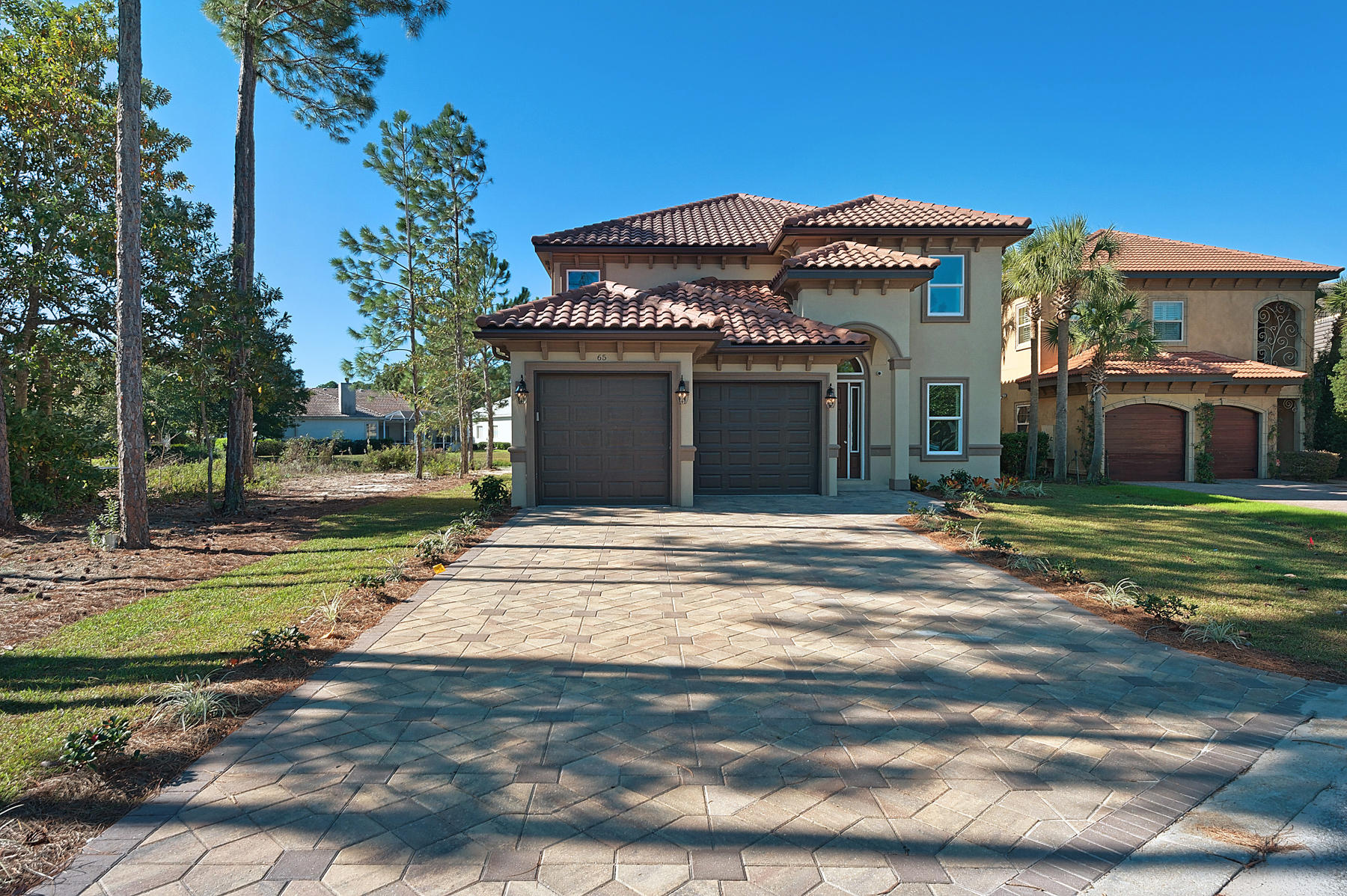 Brand new ''Lake Front'' custom built home built by the prestigious builder, Waghi Gargas in Emerald Bay. Drive up to your New home on the intricately patterned paver driveway and discover once inside all High End finishes with two separate living areas down and upstairs, and a Gorgeous Master Bedroom Suite located adjacent to the enclosed pool and lanai. The kitchen is AWESOME, & the very latest sound, lighting, and security systems' are provided for your entertainment purposes and peace of mind. Why not live in a Wow home in such a wonderful setting? Make your appointment to see it today