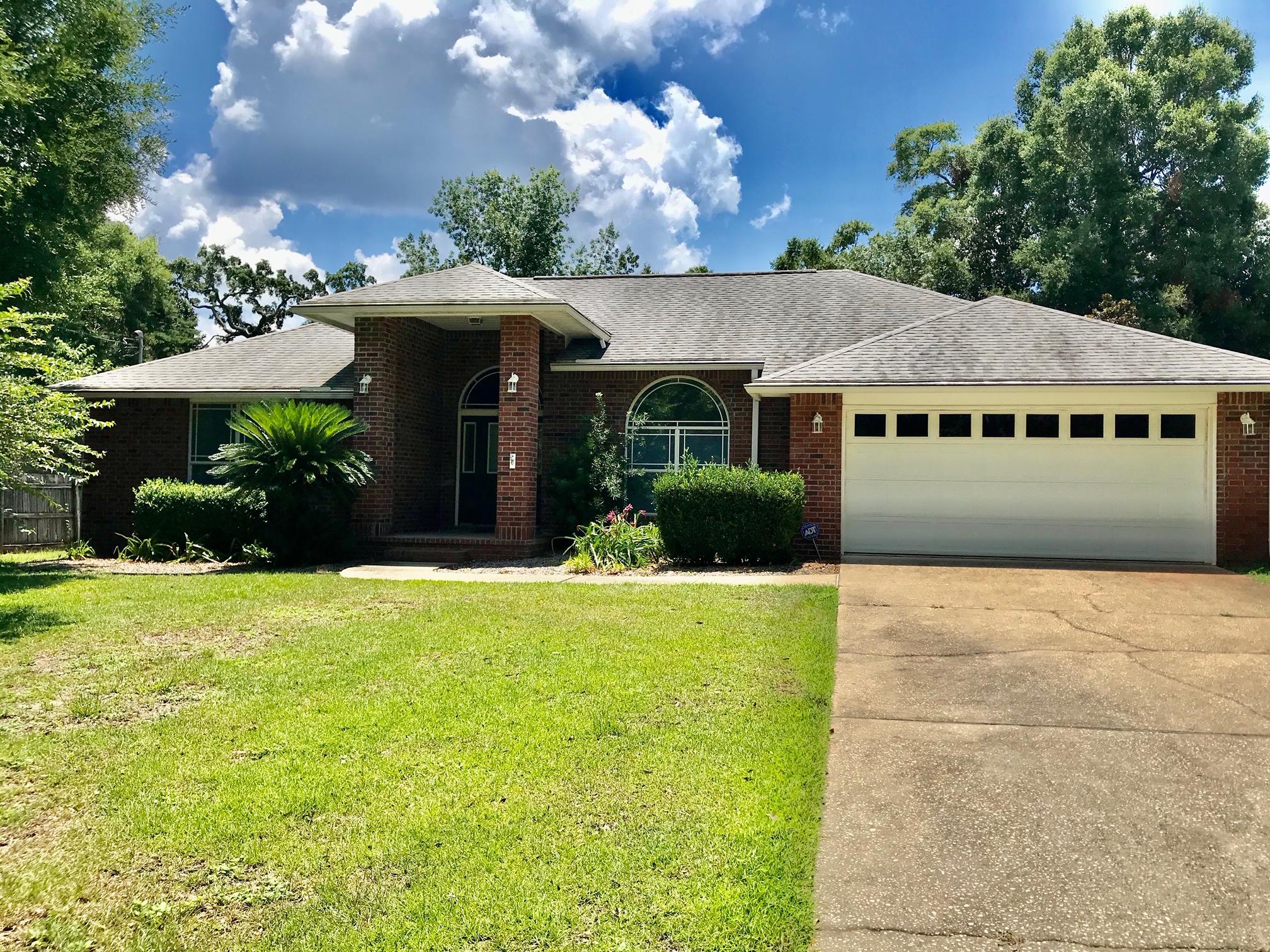 First time rental with NEW CARPET & PAINT.This home has it all with open floor plan & vaulted ceilings in the main living area. The home comes with all appliances including washer& dryer and refrigerator. There is a heat pump/air conditioning system. Ceiling fans throughout the house. Lots of closet and storage space. The floor plan includes split floor plan master bedroom and other bedrooms separated. The master bedroom has his and her walk-in closets and vanities.There are beautiful built-in bookshelves in the living room.You can also enjoy the large screened-in back porch on a nice summer afternoon. Window treatments are included throughout the house.This is a must see home and an excellent rental. This home will likely be ready to rent by July 1st. This is a No-smoking and No pets home