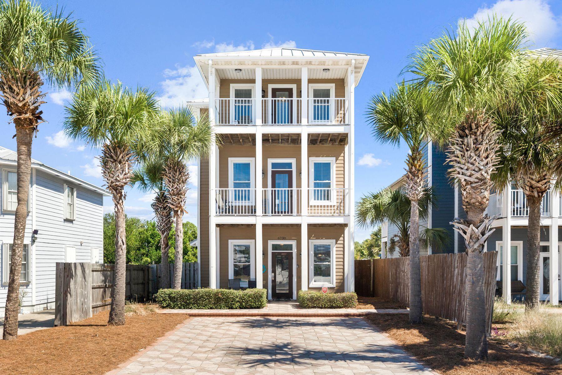 This beautiful three-story private home offers the perfect combination of comfort, style, and convenience just off Thomas Drive—less than a mile from beach access and only moments from a public boat ramp. Whether you're looking for a serene primary residence, a second home by the beach, or a vacation rental, this property delivers.
The first floor features a spacious open living area and a beautifully designed kitchen with granite countertops, stainless-steel appliances, and ample space for entertaining. A private bedroom with an en-suite bath is also located on the main level, offering comfort and flexibility for guests or multigenerational living. Upstairs, two additional bedrooms each include their own en-suite bathrooms, while the third floor serves as a loft style bedroom with lounge space and a private balcony showcasing views of the emerald waters of the Gulf of Mexico. Covered porches and balconies on all three levels make it easy to embrace the coastal lifestyle and enjoy morning breezes or evening sunsets.
Designed with both relaxation and entertainment in mind, this property offers 4 designated bedrooms, 3 with en-suite bathrooms, and 1 ensuite half bath and an additional 1st floor
 half bath. With accommodations for up to 16 guests, everyone will have their own comfortable space to unwind. The home is being sold fully furnished, making it turnkey for vacation rental use or immediate move-in.
Step outside to discover a private backyard, enclosed by a privacy fence and featuring an "Endless Pools" swimming pool. This is the perfect spot for gatherings, chilling after a day on the water, or stargazing in peace. With ample parking, luxury finishes, Gulf views, and a location that puts both boating and the beach close to your doorstep, this property checks every box.
Don't miss this opportunity to own a luxury coastal home that blends convenience, income potential, and the best of Florida beach living.