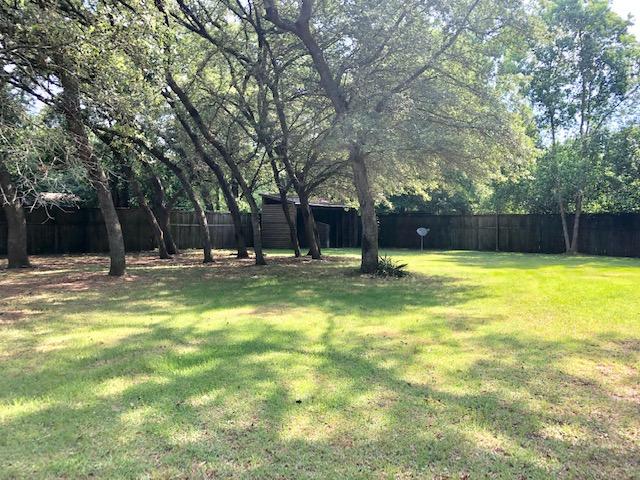 Gorgeous lot in Seminole Subdivision. This listing is for four lots Parcel A, Parcel B, Parcel C and Parcel D each 50 foot across and approximately 196 foot deep. Can be used as one homesite or you can build 4 homes. Supplemental documention shows the division of four lots. Beautiful trees, privacy fencing on three sides, used to be two tiny homes on these lots. Don't pass up this for development or for a beautiful homestead.