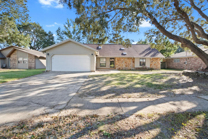 AVAIL: 8/9. FLEXIBLE S/D = TO 1 MONTHS RENT CAN BE BROKEN UP IN 2 MONTHLY INSTALLMNTS IF QUALIFIED. PETS ALLOWED UPON OWNERS APPROVAL & WITH A NON-REFUNDABLE PET FEE! This gorgeous home is situated on a cul-de-sac 2.5 miles from Hurlburt Field's back gate. This 4 bedroom 2 bathroom home features a nice sized living room w/ vaulted ceilings & a wood burning fireplace. Beautiful updated kitchen w/ stainless steel appliances, smooth close drawers, peak through window to the dining area & a breakfast bar. The master has double vanity sinks, a window bench seat & shelving. The 4th bedroom is upstairs by its self & could be used for a man cave, playroom, office, or gym. The fenced backyard has an open deck & a LARGE shed that is 8 x 12 w/ a loft. Call to see today- this one wont last long!