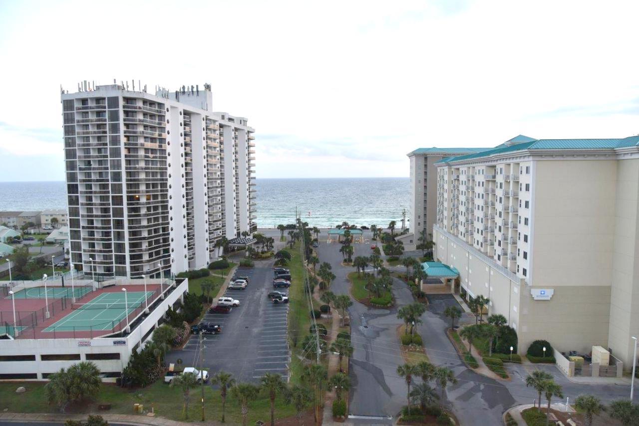 Not too high, not too low....but just right!
Being in the middle of the building lets you enjoy the Gulf head-on, see beautiful sunsets down the coast, be away from the noise and still see all the action below. This quaint, tastefully-decorated unit boasts rich-looking cabinetry, granite counter-tops, stainless appliances, tile floors and a generous balcony. It's only 250 yrds to the sand and in walking distance to almost a dozen restaurants, golf, tennis, water sports and the new Seascape Town Center. Also, it's a short drive to Silver Sands Mall, Grand Boulevard, Baytowne and 8 top-ranked golf courses. Be sure to view the 3-D tour and watch the short walk-thru video to experience this great unit from the safety of your own home! Buyer to verify all dimensions.