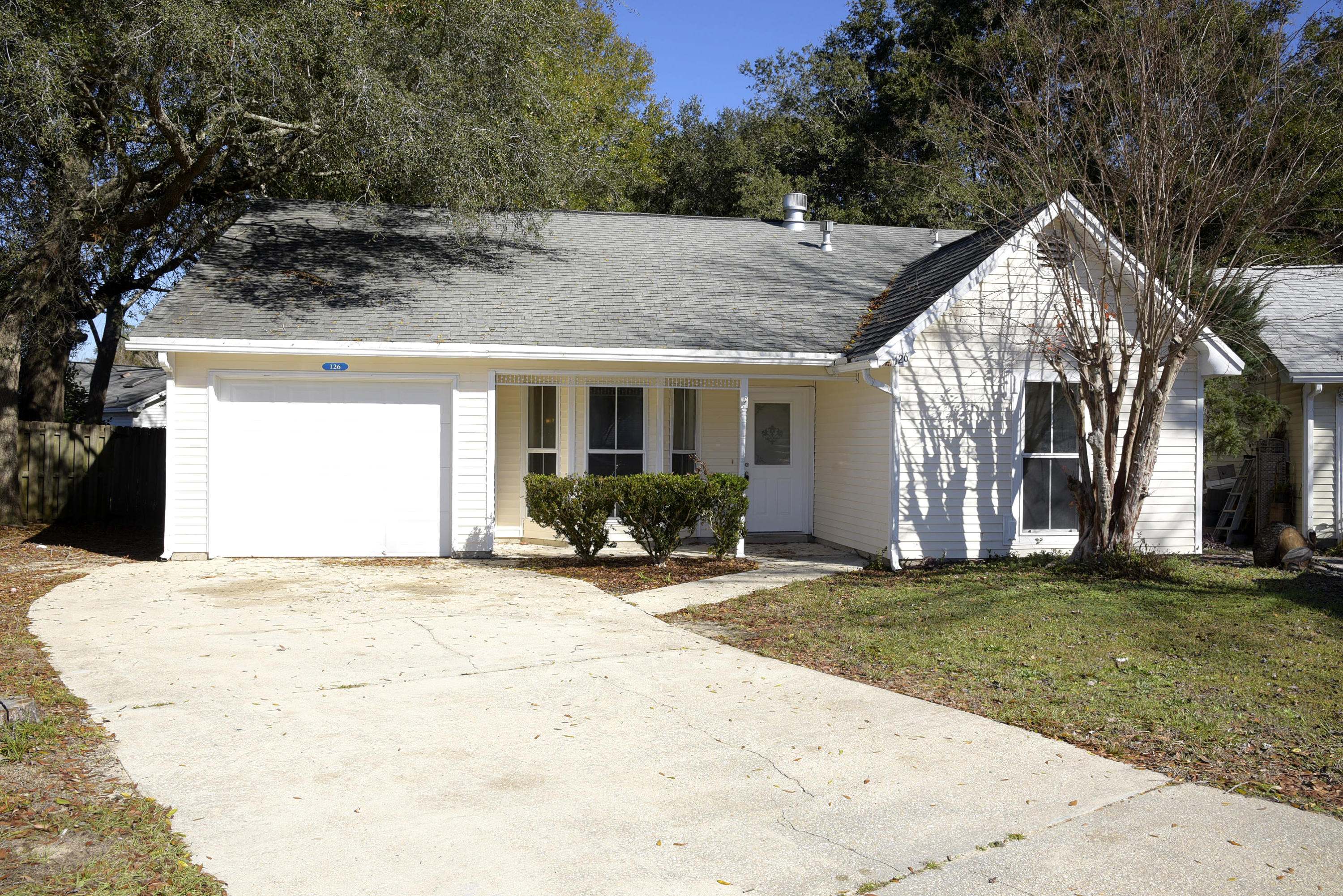Have you been searching for an affordable home in a great location?  You'll love the open floor plan featuring a wood burning fireplace in the great room and access to both the eat-in kitchen and the screened porch overlooking the large fully fenced backyard. New carpet and paint were added in December 2020 along with a new ceiling fan in the screened porch. Porch is in the process of being re-screened - will be completed prior to closing. Enjoy all the amenities that Bluewater Bay has to offer along with close proximity to Bluewater Elementary, shopping and businesses.  Come take a look today!