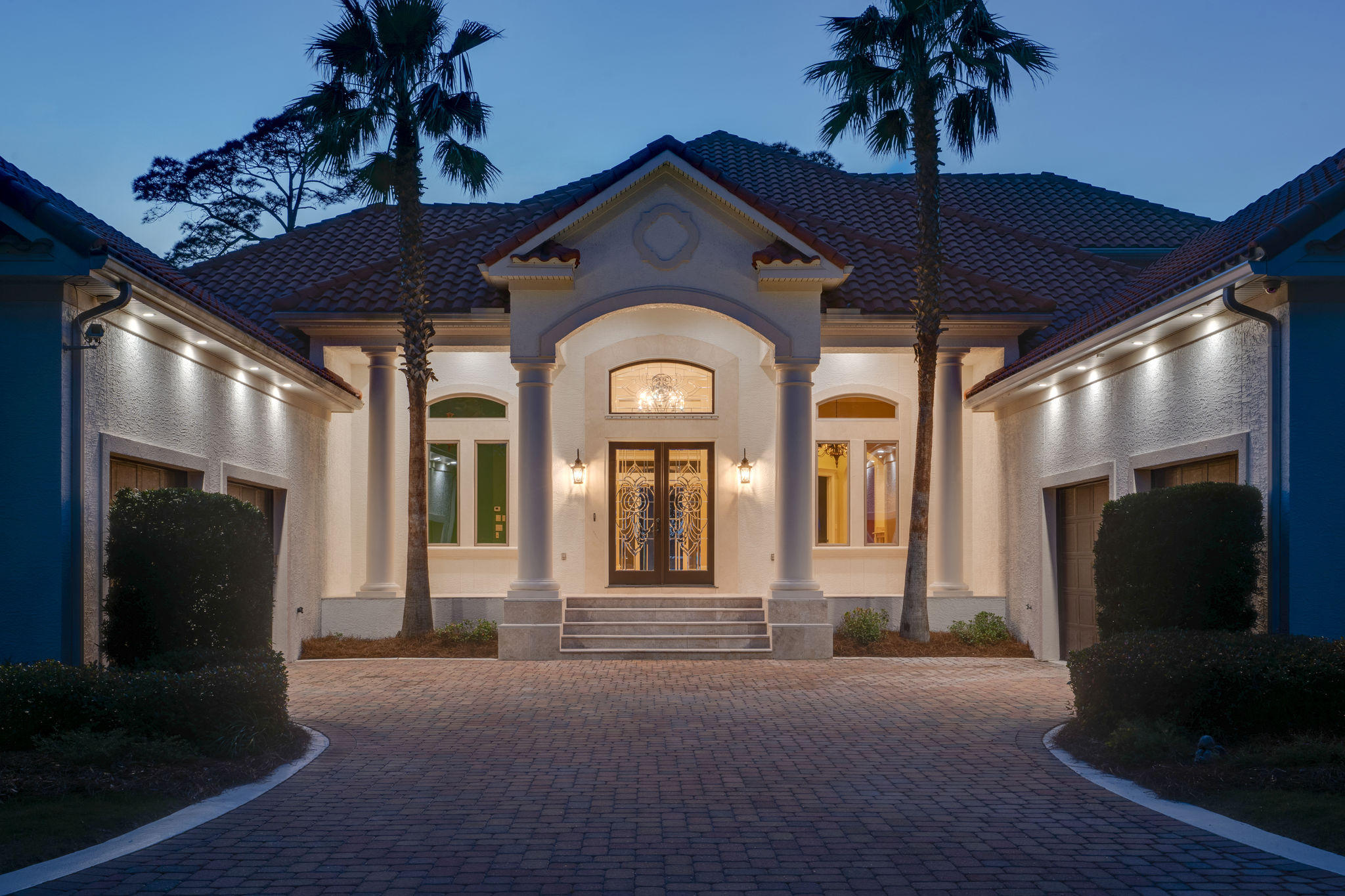 Elegance abounds in this luxurious, Mediterranean European-style Estate built by CD Jones. This beautiful Bay front estate begins with an impressive gated entry and circular paver driveway featuring a center fountain. Home situated on sparkling Fourmile Point BayFront in Driftwood Estates. Beyond the gated entry are softly illuminated lighting at twilight .Front Entry porch is set in all natural stone. Inside, the striking, two-story foyer leads you to the Formal Living area with Grand Piano in place , then leads right out to the expansive pool and outdoor living area. Fabulous finishes, the home features four bedrooms, 5 full bathrooms 1 half-bath. Master suite and privacy garden conveniently located on the first floor. The gourmet kitchen has top-of-the-line appliances and adjoining butlers pantry.Other amenities include formal den/ library. Features include custom Built-Ins in family room, Den/Library and in both dining areas. Overlooking the Bay is the spacious lanai with a full summer kitchen. Beyond, the swimming pool and spa is surrounded by ample lounge areas and offers sweeping Bay views. A gorgeous second-floor balcony also affords views of the dock, 20,000 LB boat lift (host for up to 40-42 ft vessel and hull design) 180+degree water views. Other Features hurricane shutters, solar panel heater to heat pool, Hardwood floors throughout, granite counter tops in kitchen, customized woodworking in kitchen, crown molding throughout, stainless steal Thermadore and GE kitchen appliances, oversized pantry,  built in bookcases and cabinets, concrete pool with built in over spill spa,pool waterfalls with outdoor wet bar and grill, courtyard off of Master bedroom, Upgraded media wiring with Bose Surround sound , fireplace, Office off of Master bed/bath, Anderson windows throughout, His and Her Garages(Each are 2 Car garages), and much more.Fully Fenced with private gated entry, come see this rare Fourmile Point Estate home, your opportunity awaits.