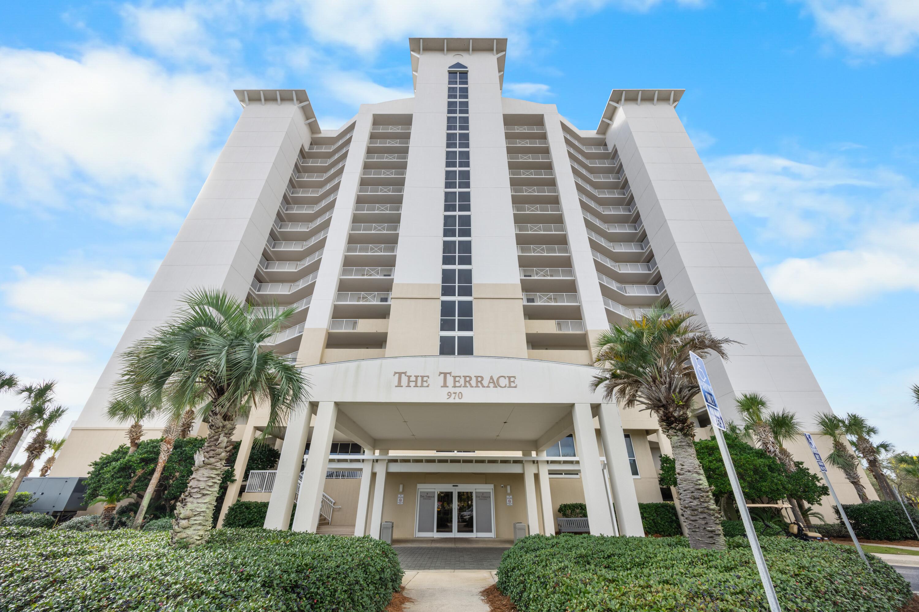 DON'T MISS YOUR WINDOW OF OPPORTUNITY!!!  Discover the coastal luxury lifestyle that awaits in the heart of Destin at the Terrace at Pelican Beach Resort.  From the moment you enter, this beautifully updated and appointed 3 bedroom, 3 bathroom corner unit condo it embodies relaxation and coastal getaway.  Bright and spacious with expansive balconies and floor to ceiling windows, unit 1107 offer incredible views of not only the beautiful lake and fountain, but the Gulf as well!  Positioned to capture an evening sunset or drink your morning coffee as the sun rises, you have to see this condo to understand the beauty that could be yours!  There are both an expansive wrap around balcony, and secondary private balcony off one of the secondary bedrooms that bring the outside in as you relax. Every inch of this condo has been updated to capture the lifestyle Pelican Beach Resort is know for.  With multiple pools, onsite workout facilities, deeded access to the private beach and onsite dining, your beach memories are made here. Terrace building is perfect for getaways, gatherings and memory making.  With an active rental rotation, you have the opportunity to invest in something in the heart of Destin that seems set apart and still close to it all.  From the kitchen remodel in 2017, to the fresh paint and removal of the popcorn ceilings in 2025, there is not an inch of this condo that has not seen an intentional improvement.  Please inquire for a complete detailed list of what has been done.  The ease of care in the newly installed LVP and the updated Bath Fitters bathroom updates in two of the three bathrooms provides luxury that lasts.  The updated furnishings keep the decor relative and fresh.  To top it all off, this unit comes with a highly coveted garage parking space.  Make your appointment today, and let's make this condo yours.