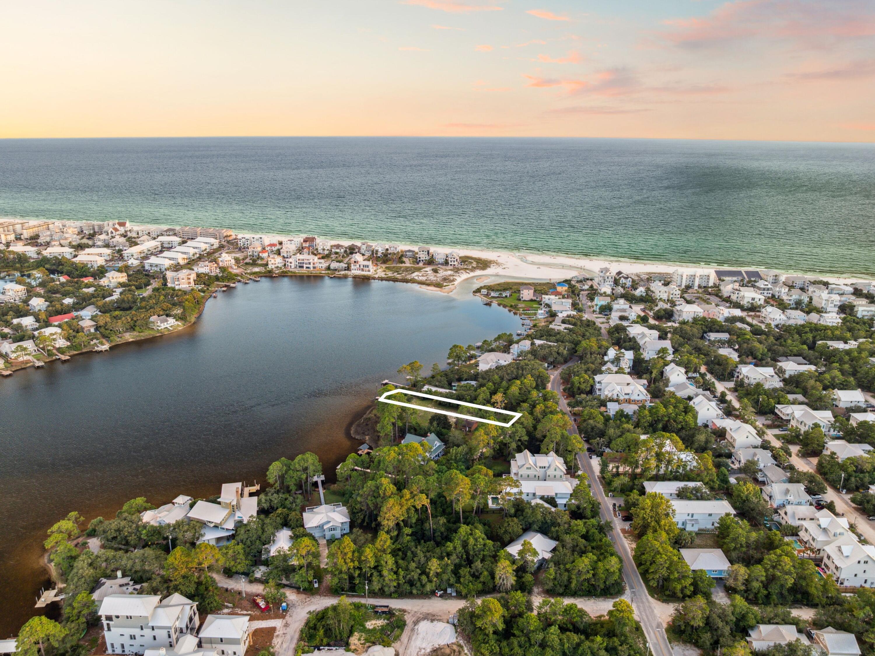 A rare opportunity to own a premier lakefront homesite on iconic Eastern Lake, Lot 11 offers the ultimate blend of privacy, natural beauty, and luxury lifestyle just south of 30A. Positioned directly on one of 30A's rare coastal dune lakes, this exclusive property provides direct access to paddleboarding, kayaking, and boating right from your backyard—culminating in sunset cruises that carry you to the Gulf. Tucked along the eastern corridor of Seagrove Beach, this property places you moments from the refined energy of Seaside, Alys Beach, WaterColor, and Rosemary, while still offering a peaceful retreat with unobstructed lake views and a sense of timeless escape.

Build your dream home with the option to expand your visionthe two neighboring lakefront lots are also available for purchase, offering a rare chance to create a legacy compound, guest house, or additional investment opportunity in one of 30A's most coveted enclaves.

Whether you're seeking a private coastal sanctuary, an elevated vacation residence, or a long-term investment, Lot 11 offers unmatched potential in both lifestyle and location. Inquire today to secure one of the last true lakefront opportunities along Scenic Highway 30A.