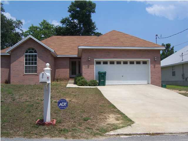 All Brick home, in the Heart of Niceville, 3 Bedrooms, 2 baths, with 2 car garage, Wood burning fireplace, coffered ceiling. Kitchen appliances include refrigerator (non-warranted), dishwasher, stove/oven. Eat in area off the kitchen and a Great Room. Washer and dryer hook ups in the indoor laundry room. Owner will consider a pet that is spayed/neutered and fully housebroken with a non refundable pet fee & a refundable pet deposit. No smoking! Anyone 18 or over wishing to live in the property must fill out an application and be on the lease. Tenants required to carry renter's liability insurance while occupying the home.