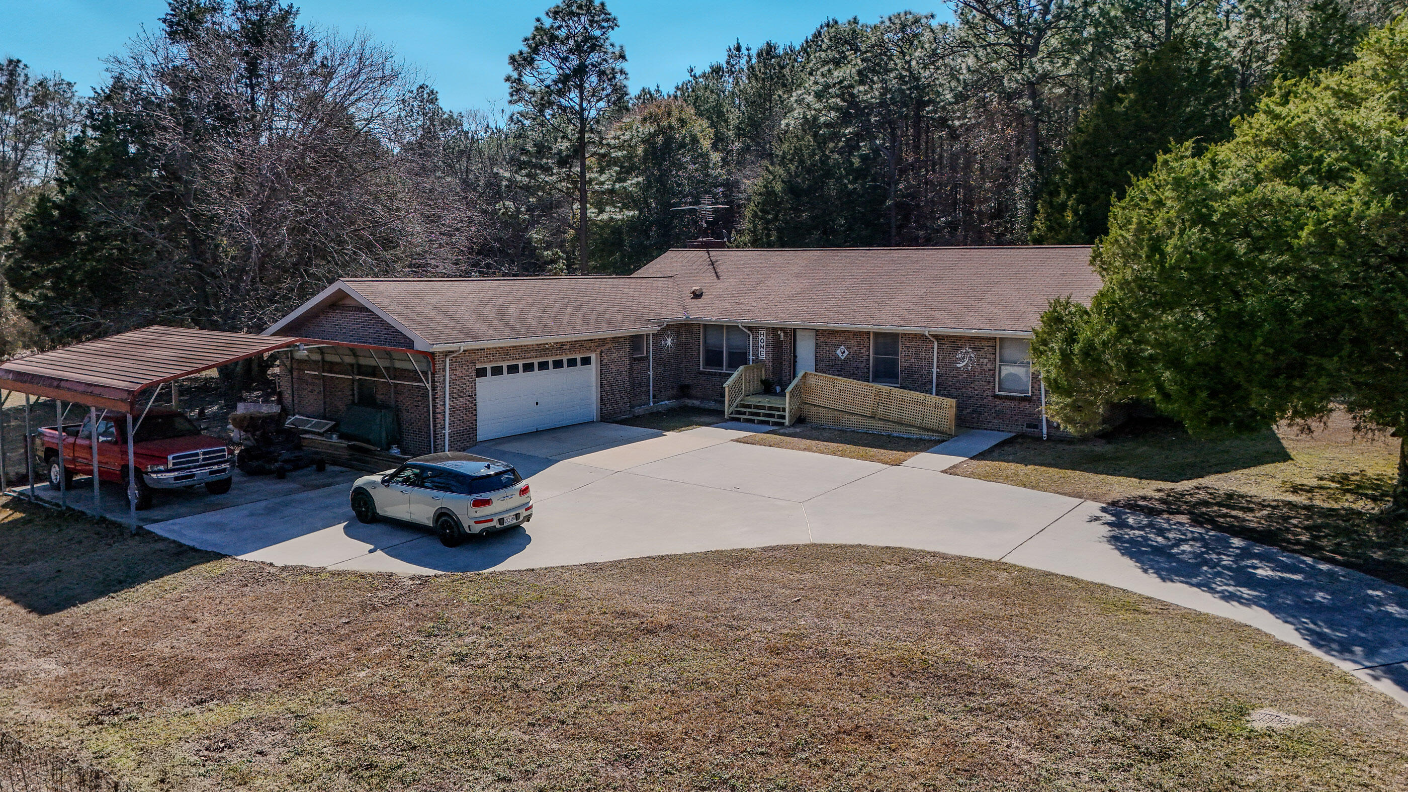 GREAT HOME IN COUNTRY WITH TONS OF ROOM INSIDE AND OUT - THIS IS YOUR HOME! SITTING ON 2.47 ACRES WITH TONS OF BLUEBERRY, FIG, AND PECAN TREES THIS PROPERTY HAS SO MUCH TO OFFER. HOME HAS A LARGE FOYER THAT OPENS TO A GREAT LIVING ROOM THAT ALSO INCLUDES A FIREPLACE. HOME HAS A HALF BATH OFF KITCHEN THAT ALLOWS PERFECT ACCESS FOR GUEST AND LOCATED JUST OFF THE LAUNDRY AND REAR BACK DOOR TO A GREAT SCREENED IN PORCH AND FENCED YARD. HOME HAS A GREAT MASTER SUITE WITH HUGE WALK IN CLOSEST AND TONS OF STORAGE IN BATHROOM. THE OTHER 2 BR OFFER GREAT SIZE AND ADDITIONAL FULL BATH. HOMEINCLUDES A HOME OFFICE THAT IS CURRENTLY USED AS A 4TH BR. HOME HAS TONS OF STORAGE, PAVED DRIVEWAY, GARAGE AND CARPORT. GREAT LOCATION TO CRESTVIEW AND TOWN WITH QUITE LIVING!