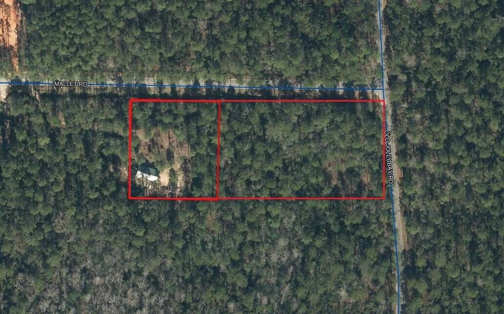 Nestled on serene Mallet Road, these three high and dry wooded residential lots, each 0.9 acres, offer privacy and natural beauty. Zoned residential, they're ideal for your dream home or an investment. Plus, enjoy the convenience--just 7 minutes to Publix grocery store and 5 minutes to the 331 bridge. This is a rare blend of tranquility and accessibility!
Three lots totaling 2.7 acres are offered for $339,000.  Seller will offer the lots individually as follows:

Lot 10 - corner of Mallet & Old Jolly Bay- $120,000.
Lot 9 - $105,000.
Lot 8 - cleared with Pole Barn - $130,000.

Ask listing Agent about a Buyer incentive for a quick close!