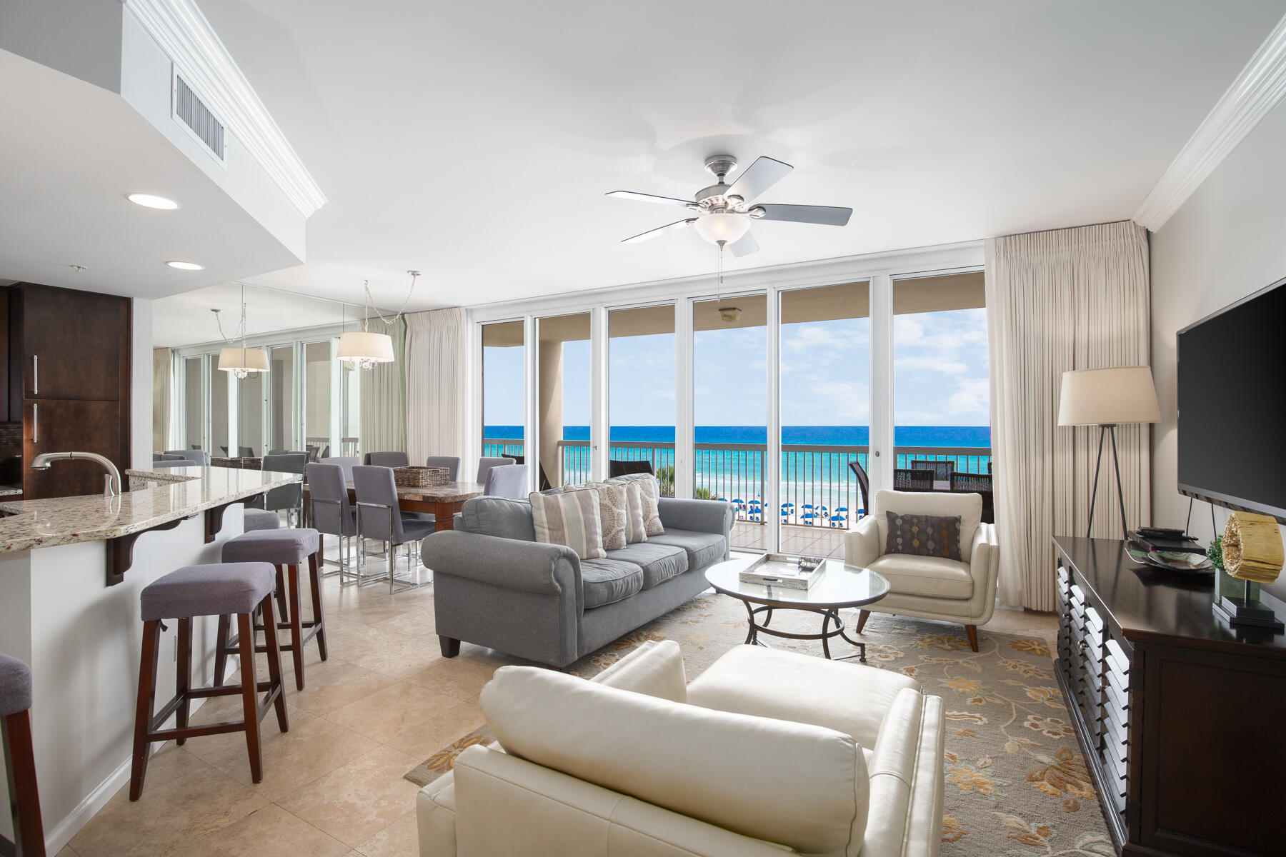 A perfectly positioned 4th Floor Luxury Beach Front Condo! Upon entering, you will be amazed at the Floor to Ceiling windows and unobstructed views of the Emerald Coast. The Balcony is spacious enough to accommodate both lounging and an outdoor dining area. This is 3-bedroom, 3-bathroom unit which also comes with a covered assigned parking space. The open floor plan allows for views from the kitchen, living and dining areas. Featuring a Beach Front Main Suite with direct access to the balcony and large windows which offer stunning views from the bed and bathroom areas. It also offers a seating area, walk in closet and an en-suite bathroom with shower, separate tub & double vanity. Two more bedrooms and bathrooms plus a full-size laundry area complete this floor plan. Sold fully furnished with rental management already in place & excellent rental history. Silver Beach is one of the most desired condos in Destin with enclosed climate-controlled hallways, semi private elevators that access just 3 units per floor. The 2 beach front swimming pools and hot tubs have a large deck area with plenty of green space for activities.