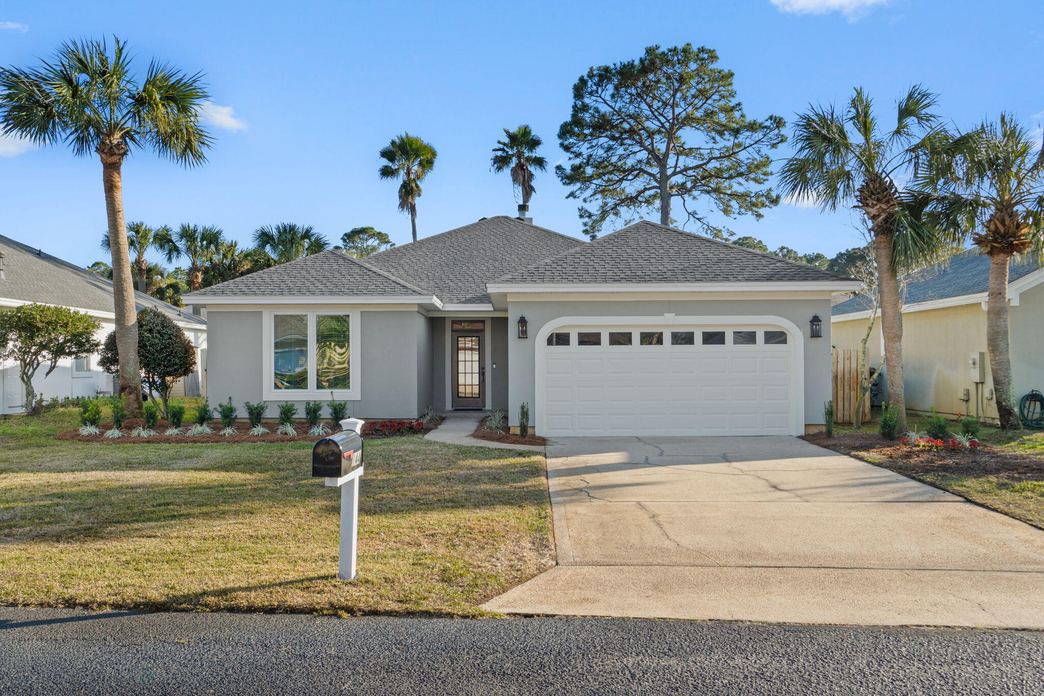 Freshly renovated and move-in ready, this beautifully updated 4-bedroom home plus heated and cooled Florida room offers a seamless blend of comfort, functionality, and coastal lifestyle. Tile flooring flows throughout the home, complemented by updated lighting fixtures and a freshly painted exterior for a crisp, modern feel.

The renovated kitchen features freshly painted cabinetry with new hardware, granite countertops, an undermount sink, and brand-new stainless appliances--creating a clean, elevated space ideal for everyday living and entertaining. Both bathrooms have been tastefully updated with new tile tub/shower combinations and new vanities. The spacious primary suite is filled with natural light and includes a generous walk-in closet and private renovated ensuite bath. The heated and cooled Florida room features a durable epoxy-coated floor and offers flexible space for a home office, fitness area, playroom, game room, or additional living area. A wood-burning fireplace adds warmth and character, while the two-car garage provides attic storage and an additional refrigerator.

Exterior upgrades include a new privacy fence with gate, refreshed landscaping, and a new mailbox. Major systems include Roof (2022), Water Heater (2017), and HVAC (2015). Additional peace of mind comes with a recent termite inspection, wind mitigation report, 4-point inspection, and impact-rated vinyl windows--one of the few homes in the community offering this upgrade.

Residents enjoy community amenities including a bayfront dock, pool, tennis courts, park, and pavilion, along with nearby county park access featuring a public boat launch, pickleball courts, and playground. Located just minutes from the bay and a short drive to the beach, this thoughtfully sized home offers an easy, low-maintenance coastal lifestyle.