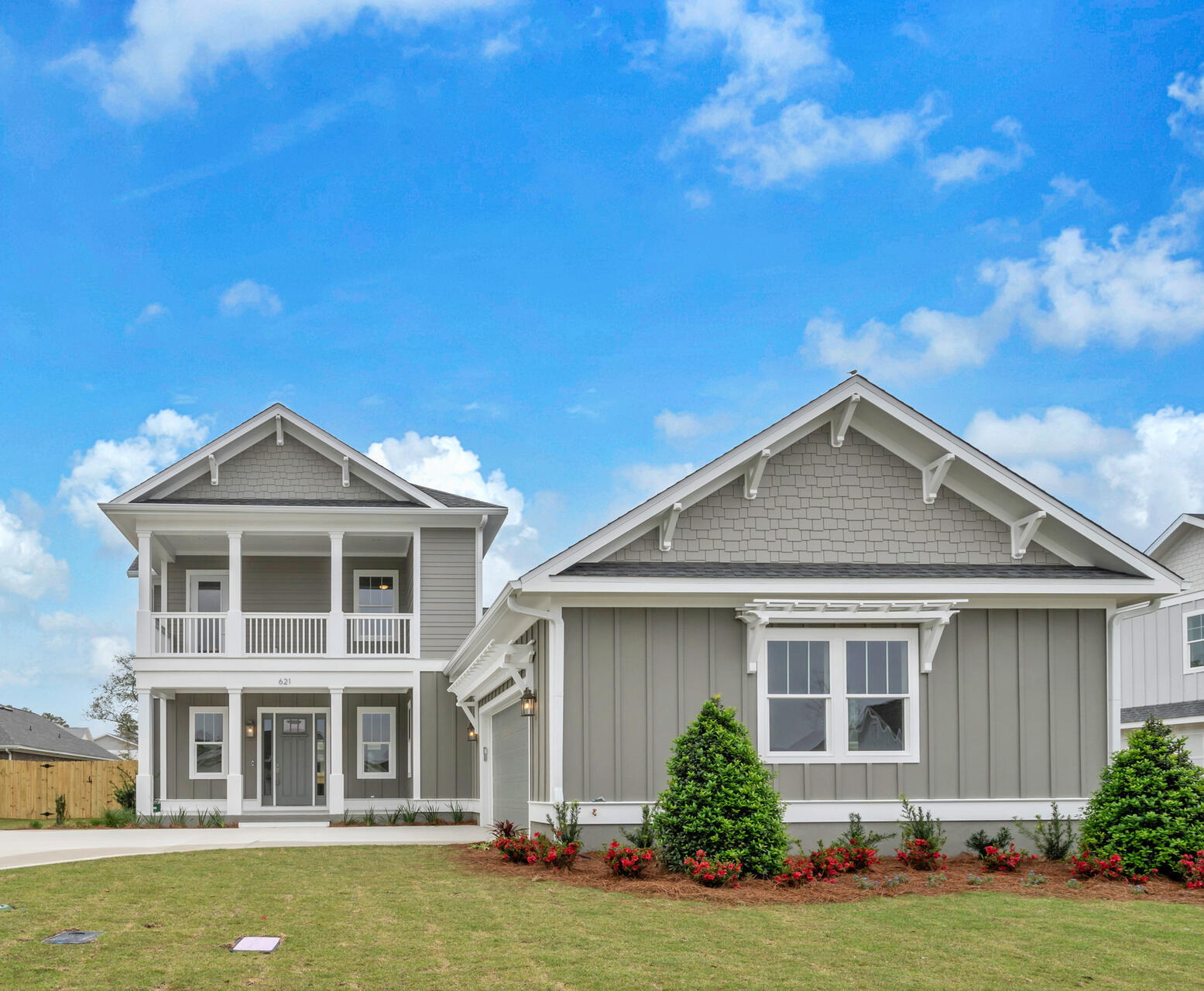 PRICE IMPROVEMENT ALERT! Exquisitely designed, 4 Bed, 3 1/2 half bath  w/ a gathering room upstairs for a media room, office, playroom or gym!Plus a wetbar. Almost 2800 sf ,open floorplan w/ceiling beams in the living, dining room and kitchen , custom trim & accent walls. Gas fireplace, surrounded by wood built ins & Sinker Cypress mantle. Spacious kitchen, w/ quartz counter tops ,custom cabinetry, metal, Z-line hood & designer lighting & walk in pantry. The master is on the first floor along w/ another guest bedroom /office. Master bath has deep, soaker tub, walk in shower and double vanities. & spacious closet! Upstairs are 2 more bedrooms, full bath & generous size gathering rm w/ a walk out balcony for star gazing.MO Builder also adds Taexx Pest System ( no need for pest control person to come inside your home It's all done at the main control center outside. Termite bait stations in place, too. Sealed garage flooring and front and rear porch. Pre wired for surround sound, cable hub for cable, Ethernet and security. Wall insulation between bedrooms, living spaces and utility room.