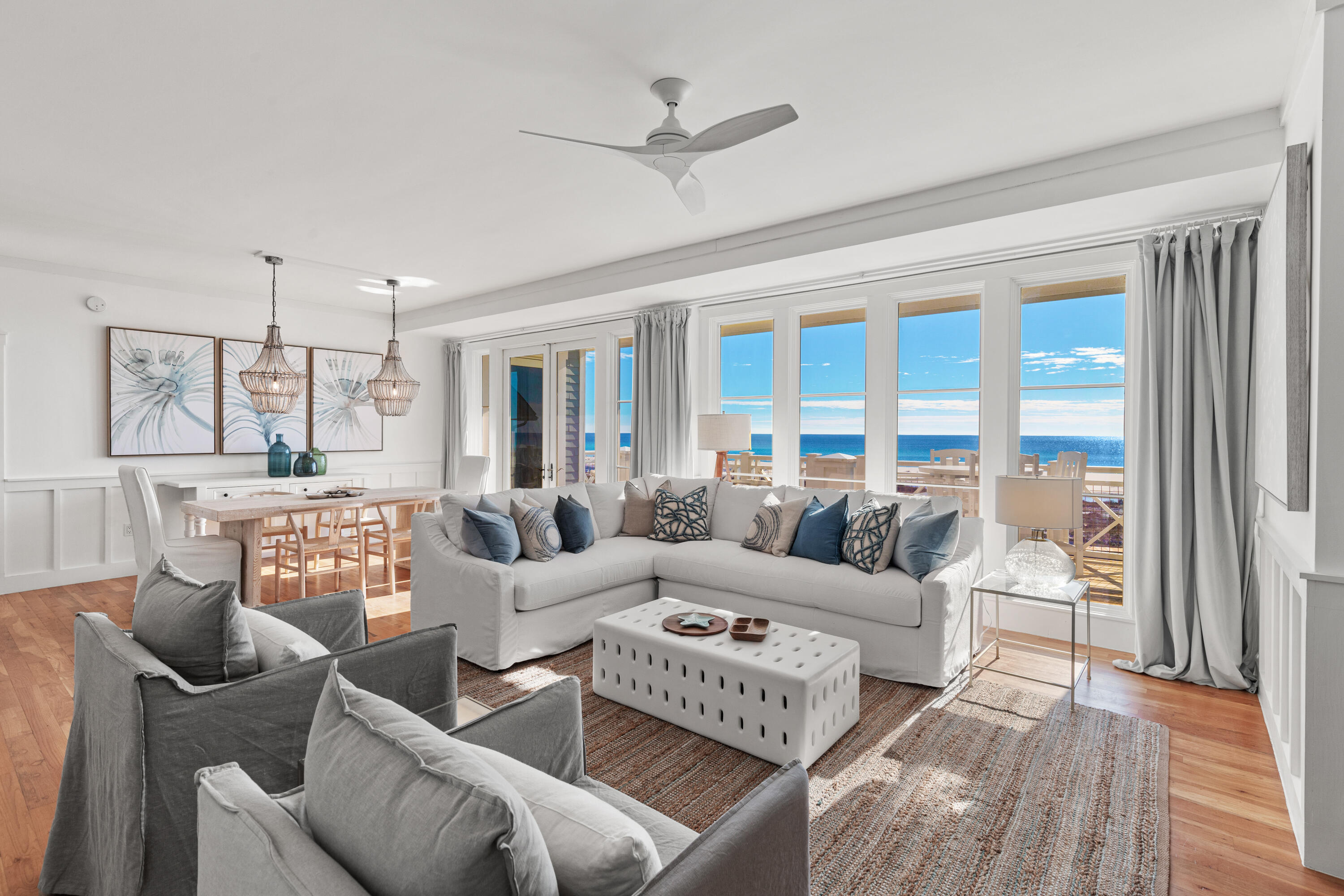 Luxury Coastal Living at Watersound Beach
Come live your dream in this stunning renovated and newly furnished one-level condo that offers an exquisite blend of comfort, style, and serene charm.  Designed by the esteemed Graham Gund Architects, this residence gracefully embraces its beautiful coastal surroundings.  Situated on the third floor and close to elevators, this spacious condo spans over 2,100 square and features an intelligently designed floor plan with full beach views from, the kitchen, dining, great room, primary suite, and guest suite.
Upon entering, expansive views greet you while you soak in an airy, vast open living and dining area, complemented by new designer furnishings that set the tone for elegant gatherings. The living area seamlessly extends to a spacious balcony, offering tranquil views of turquoise water and protective natural coastal dunes, perfect for enjoying Florida's stunning sunsets.

The kitchen, a chef's delight, features high-end appliances, ideally suited for culinary creativity. It boasts new quartz countertops, designer tile backsplash, a large, deep farmhouse sink alongside generous storage spaces, and a convenient one-level breakfast bar, making it as functional as it is beautiful. 

Providing an inviting space for relaxation, the luxurious primary suite is an oasis of comfort with full views of the quiet beachfront. The primary ensuite is a highlight, featuring a soaking tub, a beautifully tiled shower, and dual vanities, ensuring both convenience and style. 2 walk-in closets - one perfect for owner lockout.  Guests are well-accommodated with 2 additional bedroom suites, one that offers waterfront views, providing a pleasant experience for family and visitors. Adjacent to the entry foyer is a renovated half bath, making this unit 3.5 baths.  An additional desk area and private extra-large laundry make for a wonderful primary, second home, and/or rental experience.  Each unit offers a detached oversized one-car garage, a deeded parking space, and a storage closet.